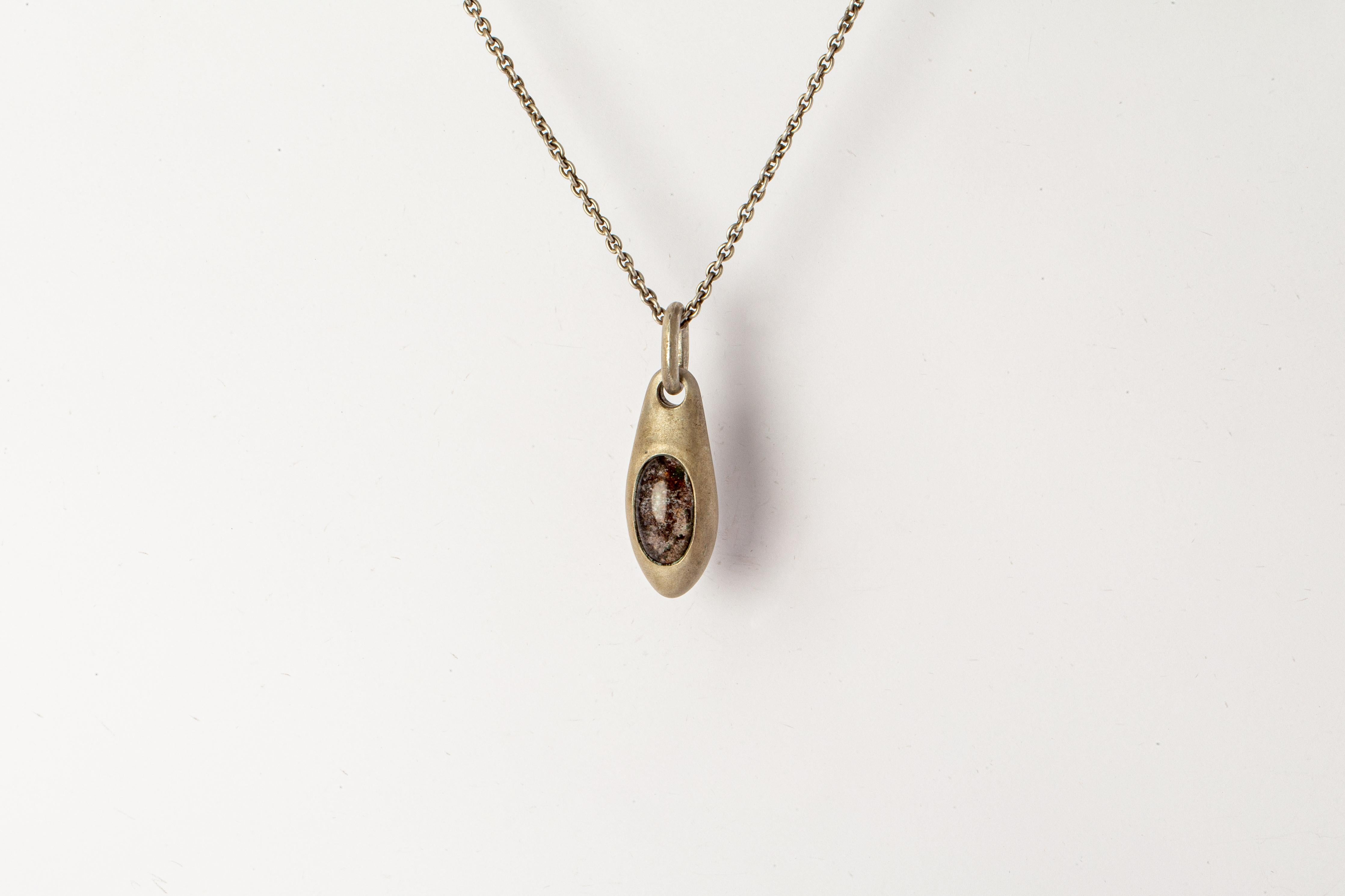 Necklace in the shape of chrysalis made in sterling silver and a slab of lodolite. Sterling silver, dipped in acid to create a subdued surface. It comes on 74 cm sterling silver chain.
This item is made with a naturally occurring element and will