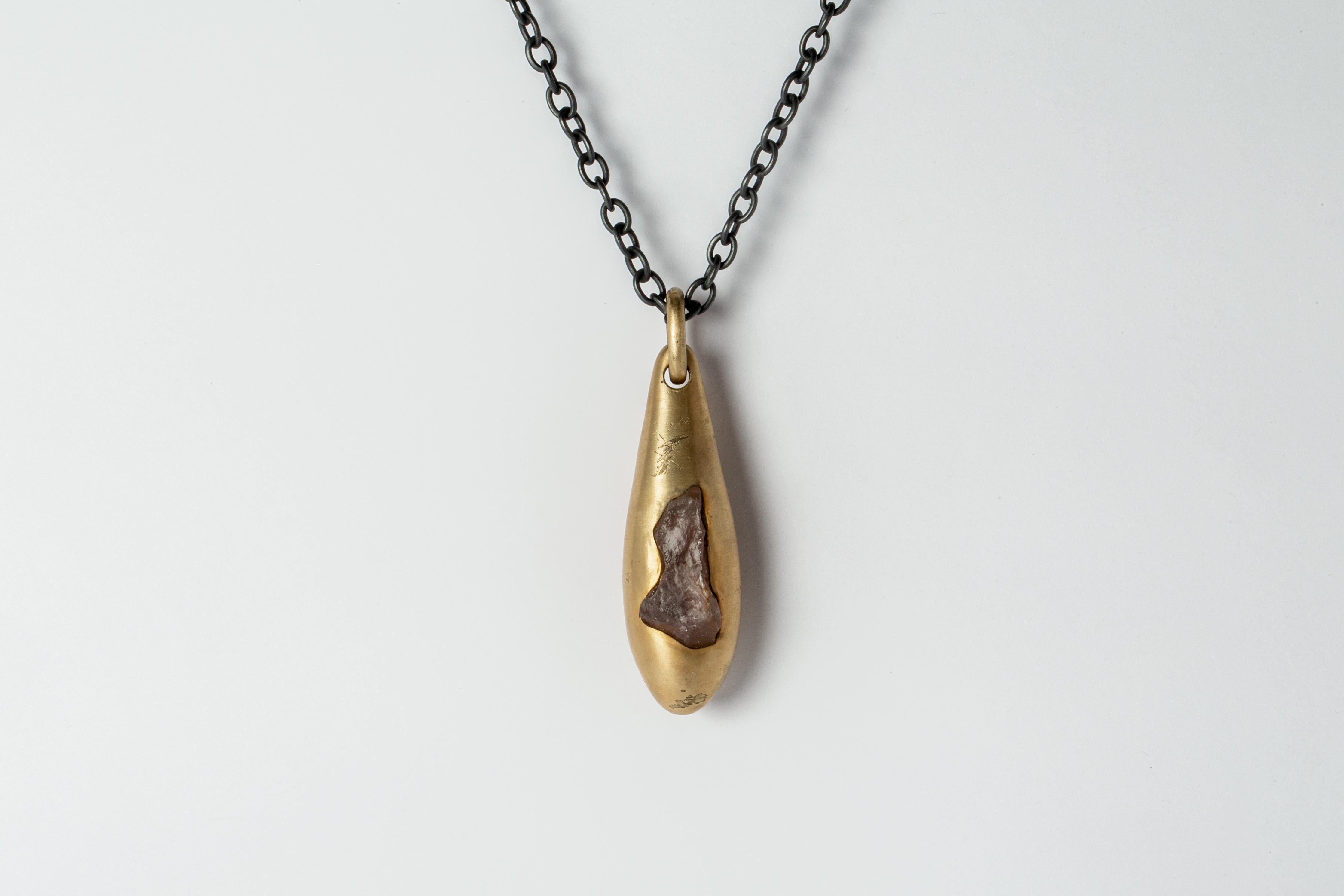 Necklace in brass with 18k gold, oxidized sterling silver, and a rough of rose quartz. The color of acid gold is came from brass substrate is electroplated with 18k gold and then dipped into acid to create the subtly destroyed surface. Its comes on