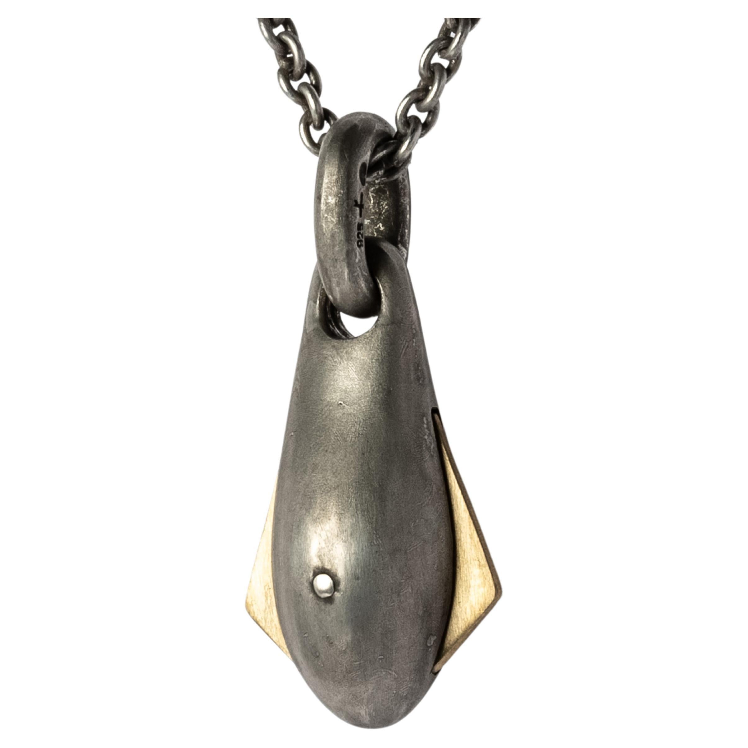 Drop necklace in the shape of chrysalis in combination of sterling silver and brass, it comes on a 74cm sterling silver chain.