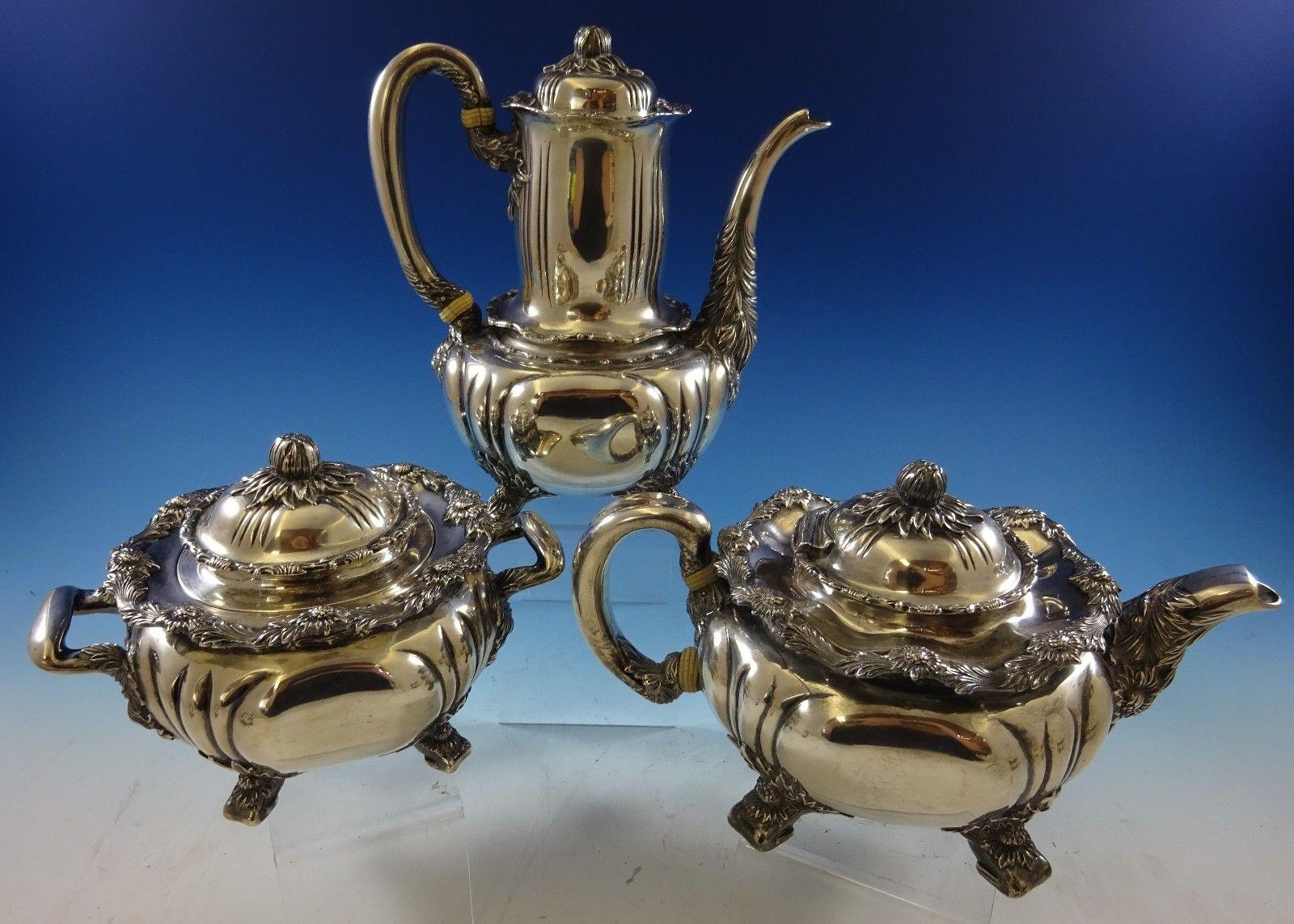 Superb Chrysanthemum by Tiffany & Co. five-piece sterling silver tea set. The pieces are marked #5960/4848. This set includes:

One coffee pot: Measures 8 3/4