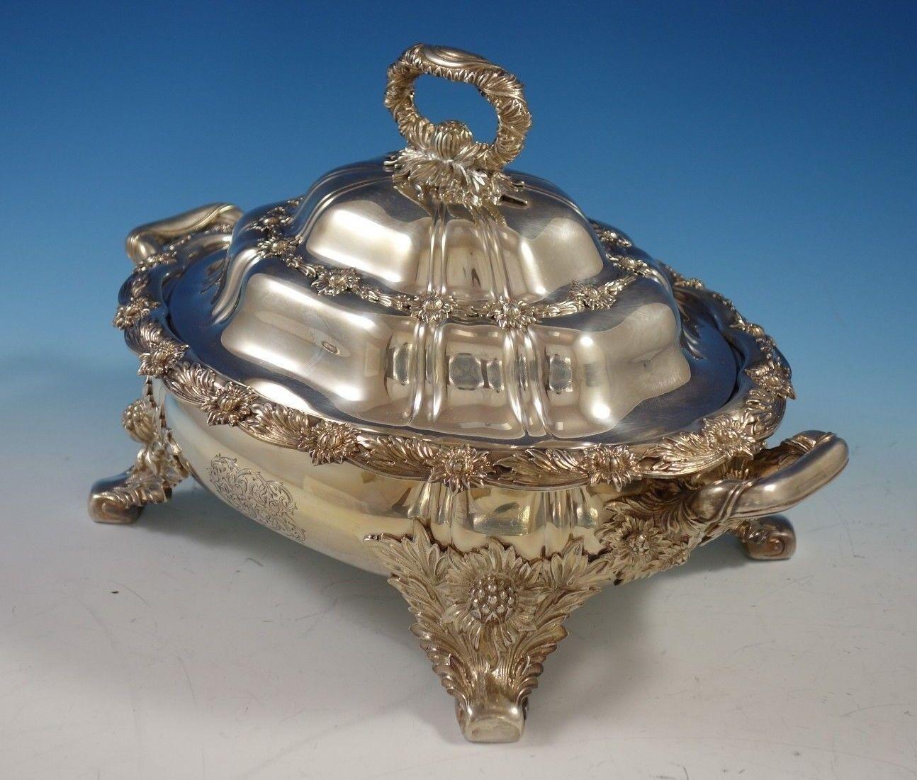 Stunning Chrysanthemum by Tiffany & Co. sterling silver footed covered vegetable dish. This dish features four large chrysanthemum feet, two side handles, and a handle on the cover. The piece is marked #5713-5957 and has a date mark M for