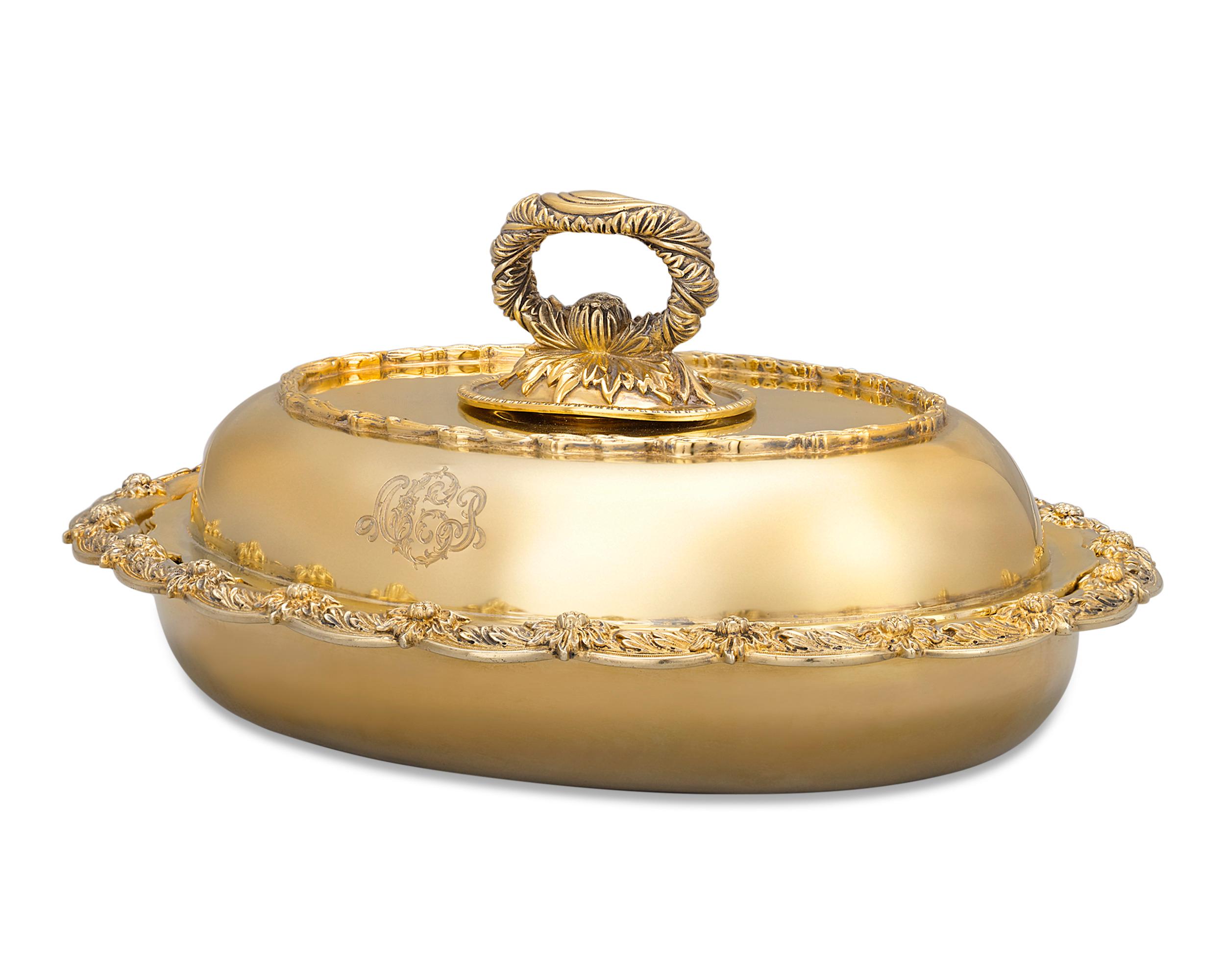Created by the inimitable American silversmiths Tiffany & Co., this exceptionally rare silver gilt covered vegetable dish is fit for an elegant table. Crafted in the firm's highly coveted Chrysanthemum pattern, the dish is an exquisite example of