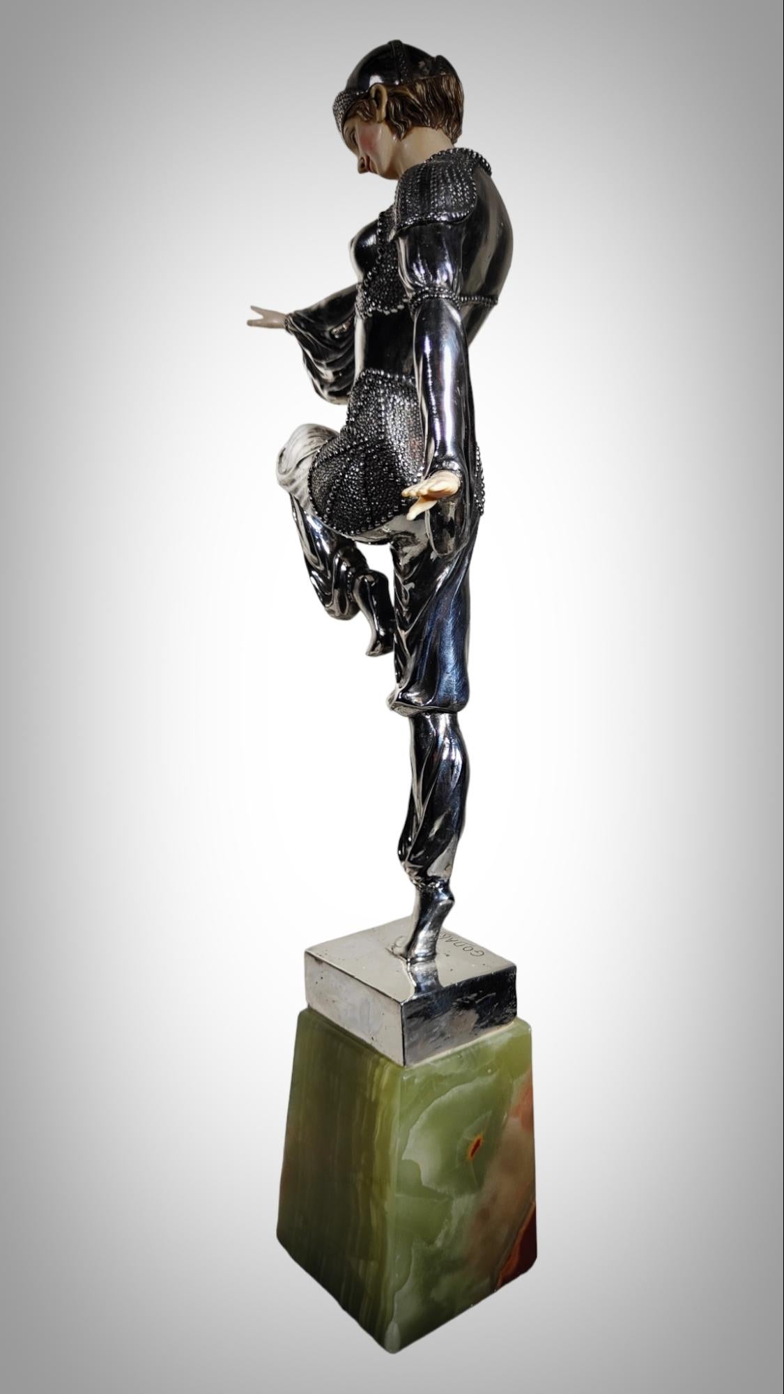 Chryselephantine Sculpture Charm Of The Orient A Godard
'THE CHARM OF THE ORIENT', A FIGURE IN silvered BRONZE CASTING AFTER THE MODEL OF A. GODARD, 1920s The dancer dressed in an exotic silver costume with turban and harem pants, standing on one