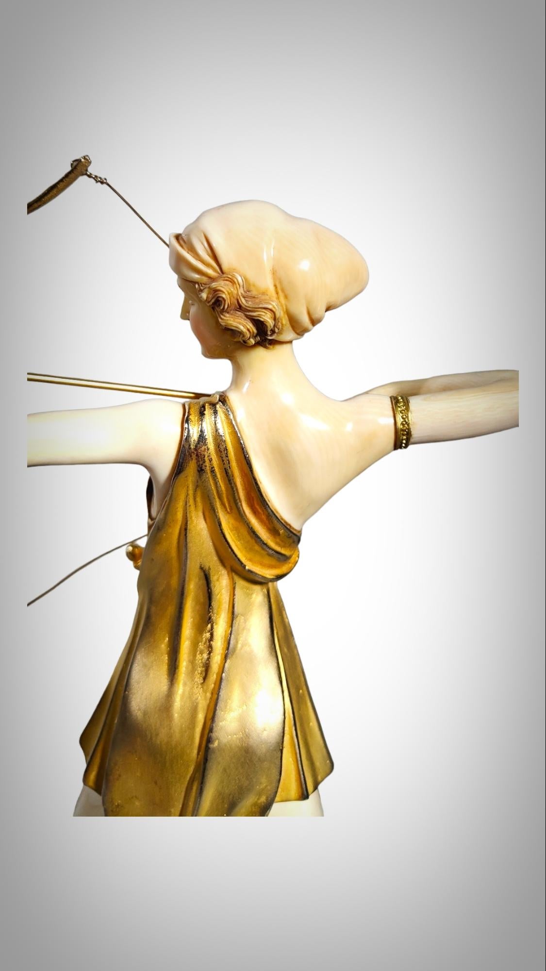Chryselephantine sculpture, gilded bronze  resting on an onyx base, Diana For Sale 1