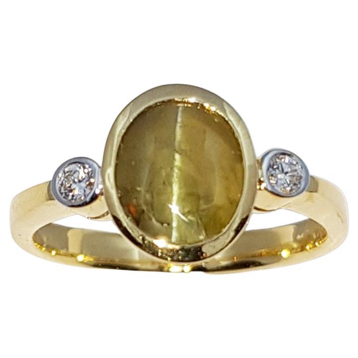 Chrysoberyl Cat's Eye with Diamond Ring Set in 18 Karat Gold Settings For Sale