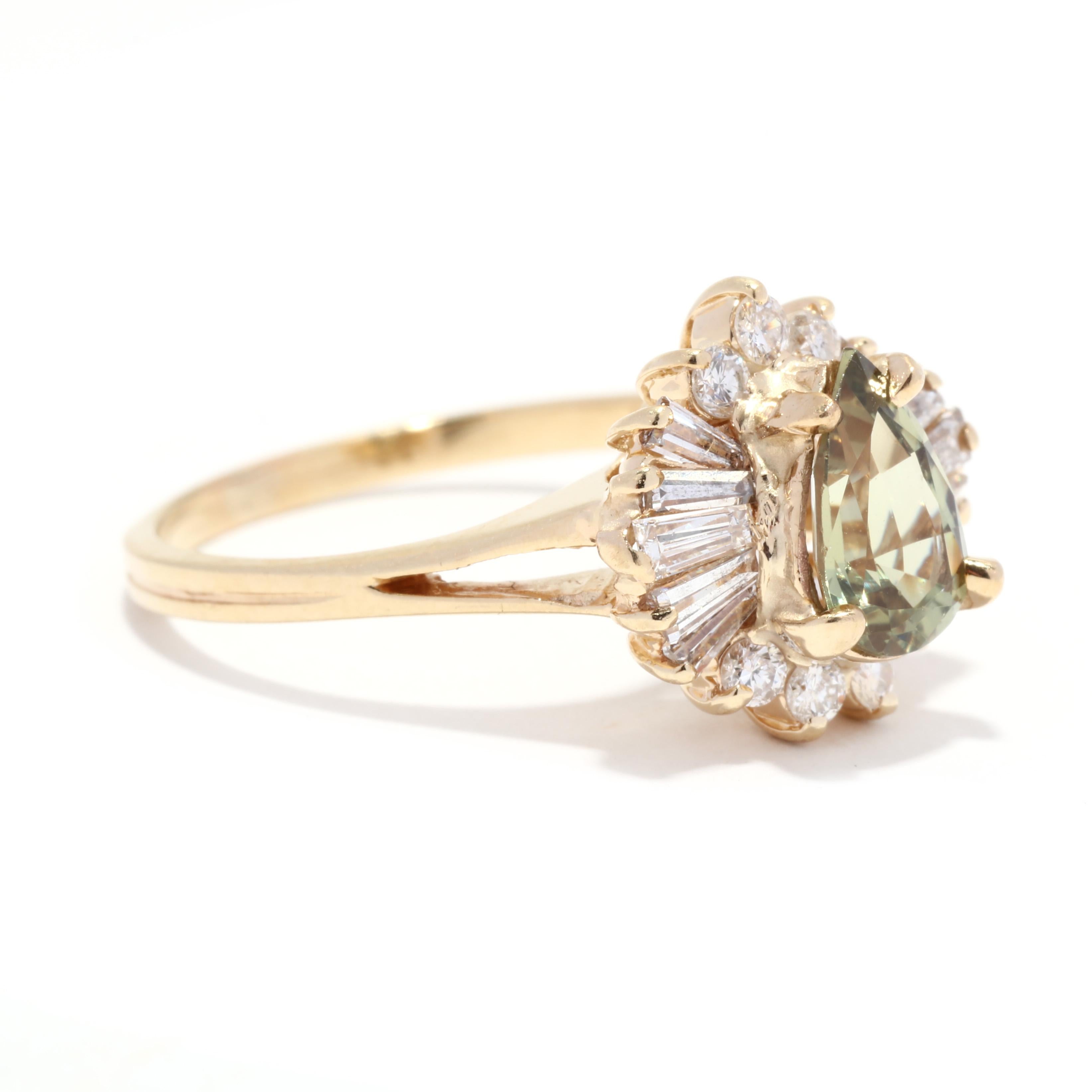 A vintage 14 karat yellow gold chrysoberyl and diamond ballerina ring. This right hand cocktail ring features a prong set, pear cut chrysoberyl weighing approximately .90 carat surrounded by a halo of round brilliant and tapered baguette cut