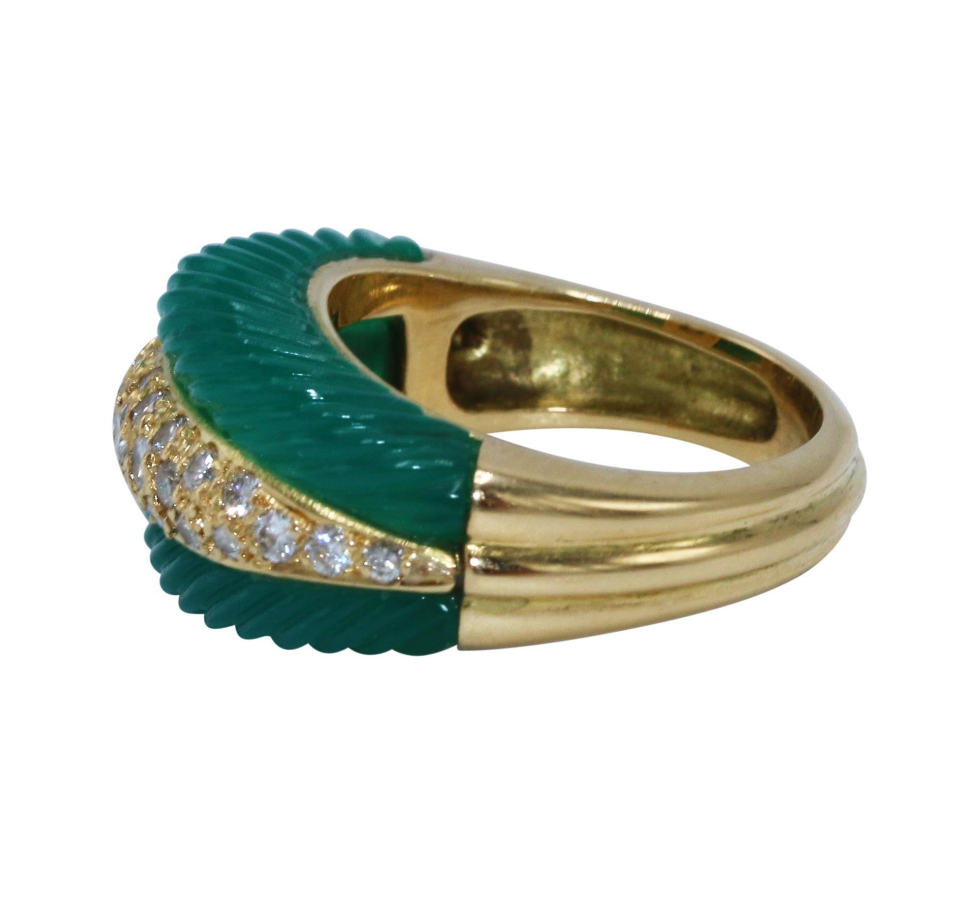 18 karat yellow gold, chrysophrase and diamond cocktail ring, of tapered design set down the center with round diamonds weighing approximately 0.50 carat, flanked by sections of fluted chrysophrase, gross weight 9.0 grams, size 5 1/2, with workshop