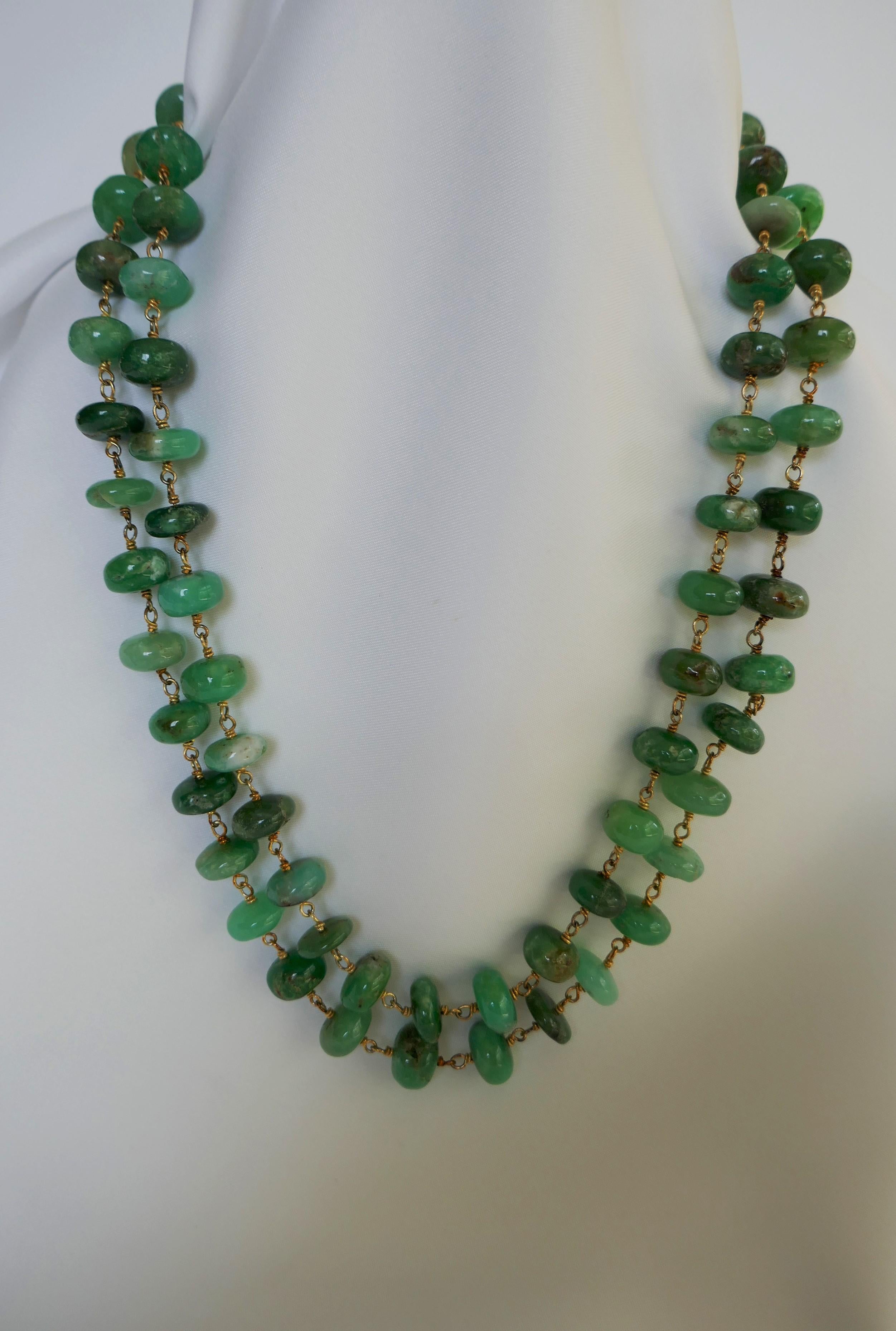 This necklace is made of  12mm - 13mm Chrysophrase (apple green and other green tonalities) roundels wire wrapped on 14k 925 sterling silver wire with a 925 oxidized silver diamond clasp. The necklace may be worn long, doubled or layered. The