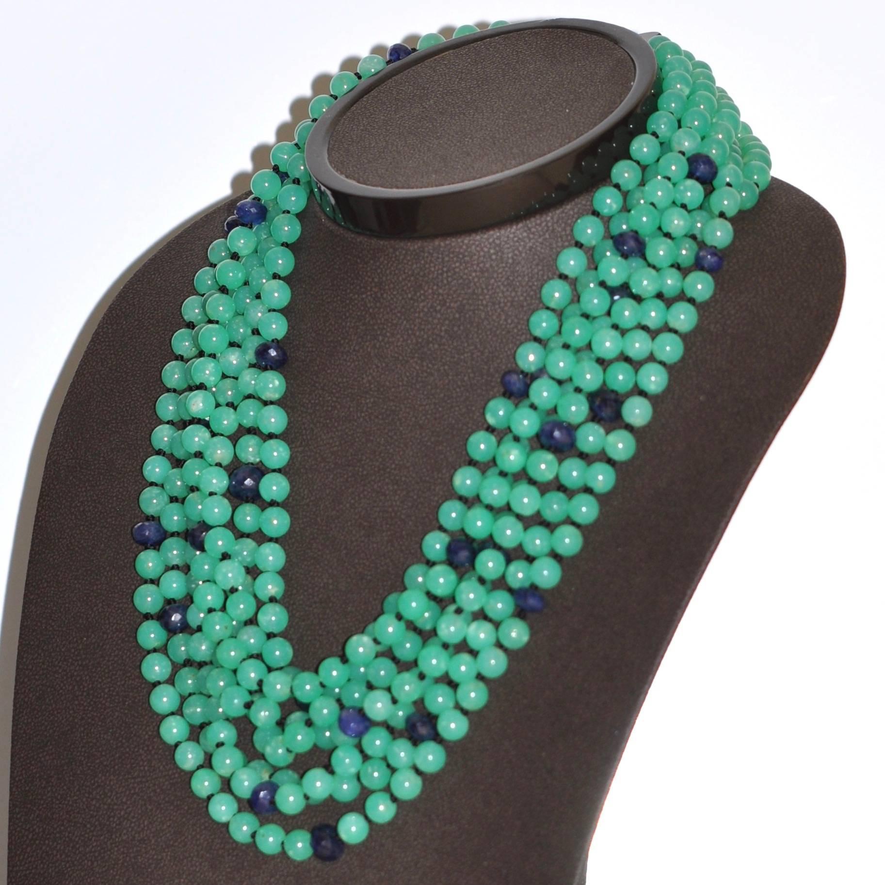 Discover this Natural Sapphires and Chrysophrases Multi-Strand Necklace.
Chrysophrases
Blue Sapphires
Bakelite Clasp