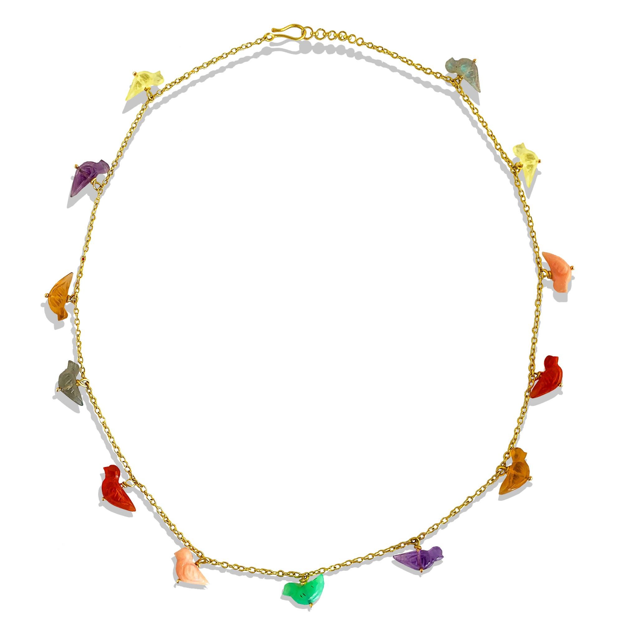 Hand Carved Necklace featuring gemstone birds in a rainbow of colors.  Lemon Quartz, Amethyst, Citrine, Labradorite, Carnelian, Chrysoprase, and Pink Opal birds hang from a 22k gold hand made chain.   I hook clasp completes the necklace.  Measures