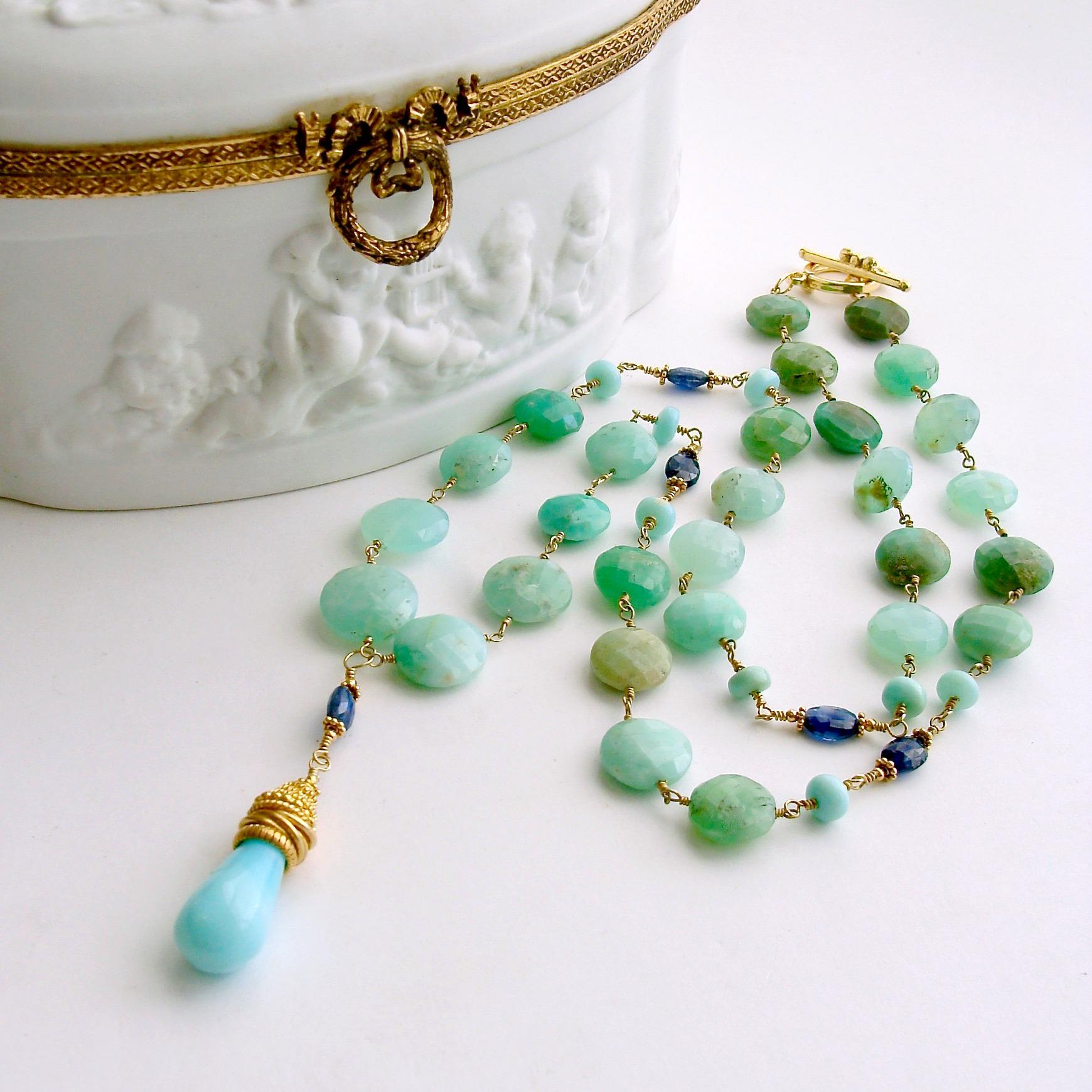 Beautiful faceted springtime mint green chrysoprase coins are the harbinger of the 2020 pastel revolution.  Intermittent stations of Peruvian blue opal smooth rondelles flanking rich cobalt blue kyanite faceted oval beads adds texture and color