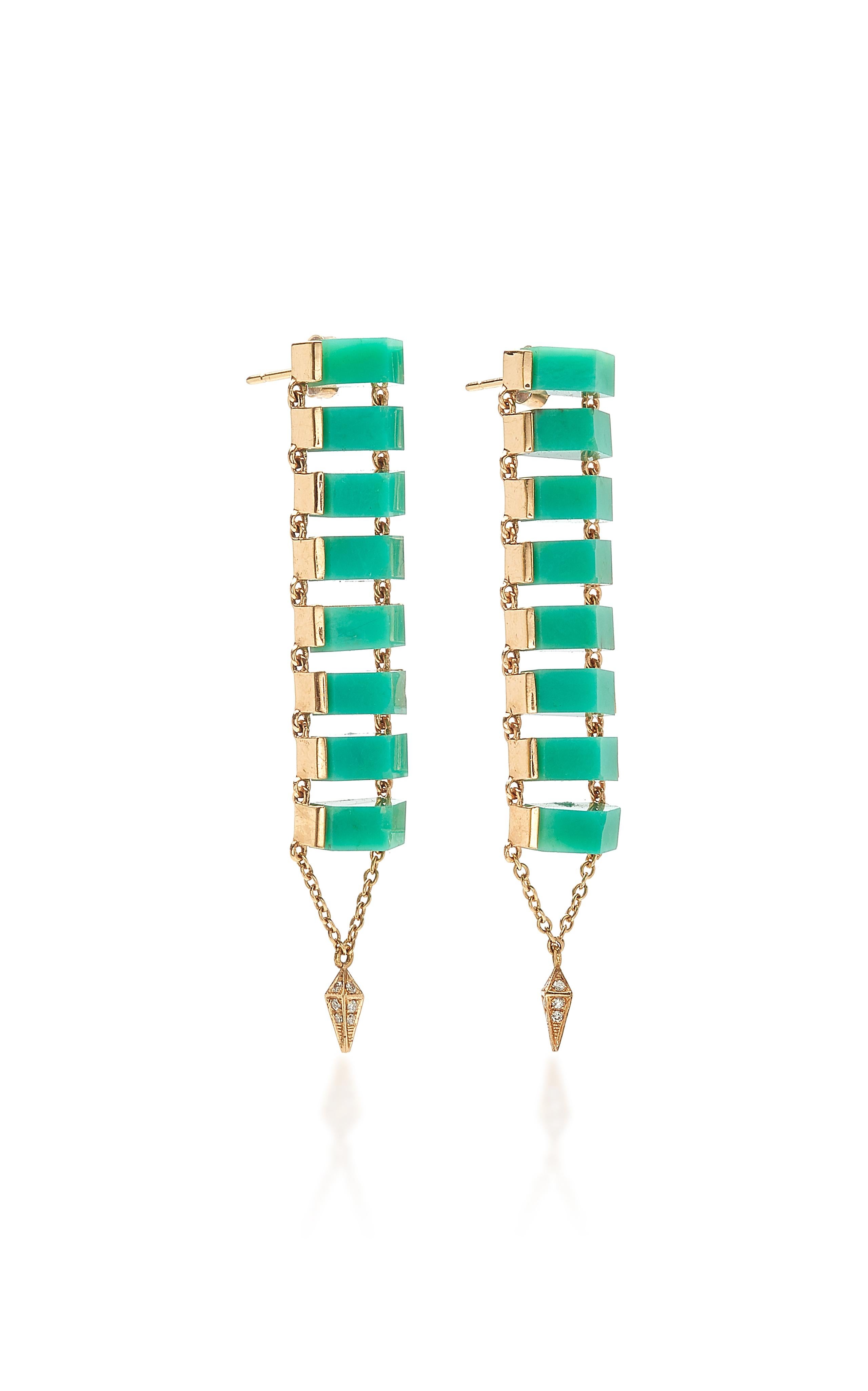 Chrysoprase and Diamond Ladder Earrings feature eight slices of Chrysoprase on each earring set downward in a linear pattern in Rose Gold and finished with Rose Gold chain and White Diamond Pyramid Tips.

18k Rose Gold : 24.4g
Chrysoprase
White