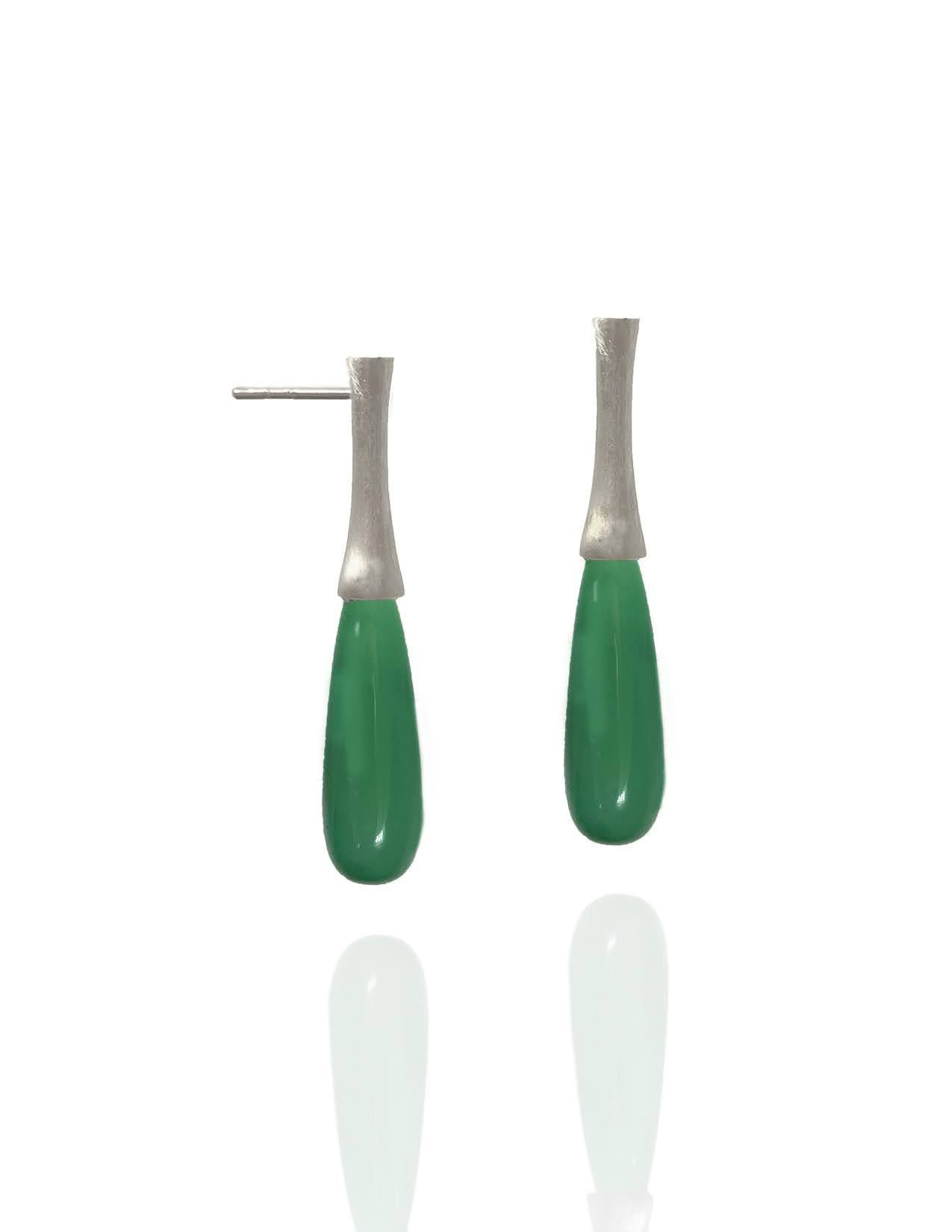 Long and elegant, these one-of-a-kind contemporary Chrysoprase drops are set in brushed silver. Earrings have a post and medium back. A perfect pop of color, these green drops are 41 carats in total weight. Total length of each earring is 2 inches,