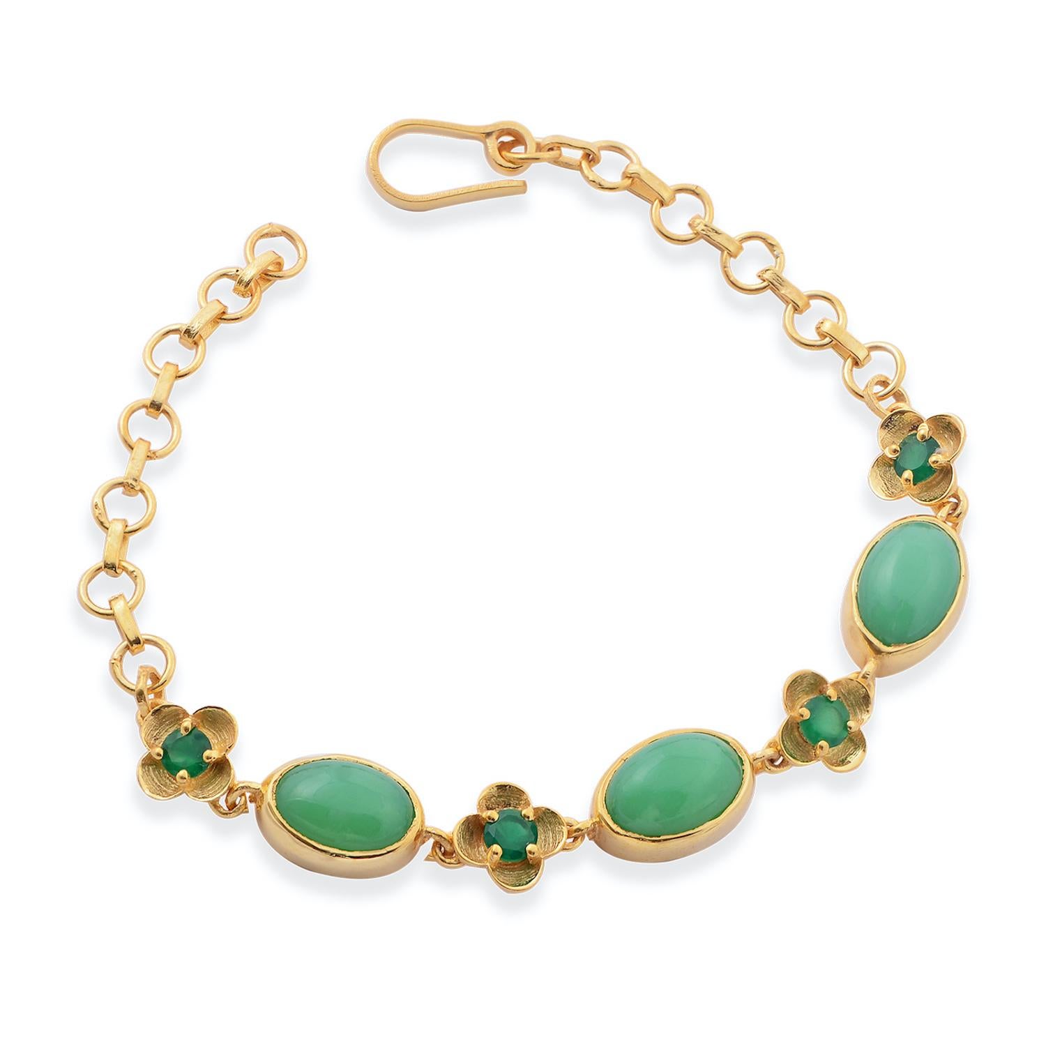 

This beautiful bracelet has been handmade in our workshops. We have interwoven chrysoprase with green onyx. The bracelet is made in sterling silver coated with 24kt gold plate and is adjustable so will fit anyone.

Central motif dimensions are 9mm