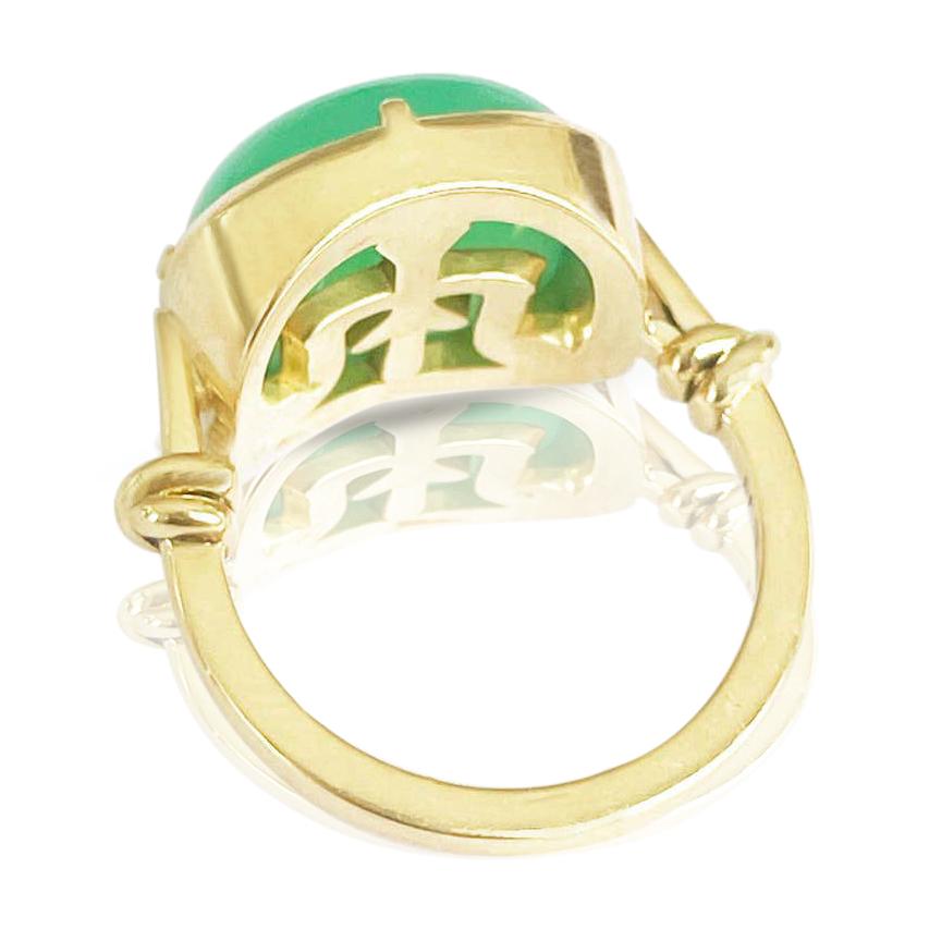Apple green chrysoprase cabochon ring set in 18ct yellow gold 'Knot' design

Bezel and claw set NSEW

Size N (UK/AUD) - resized at request

ready to ship

