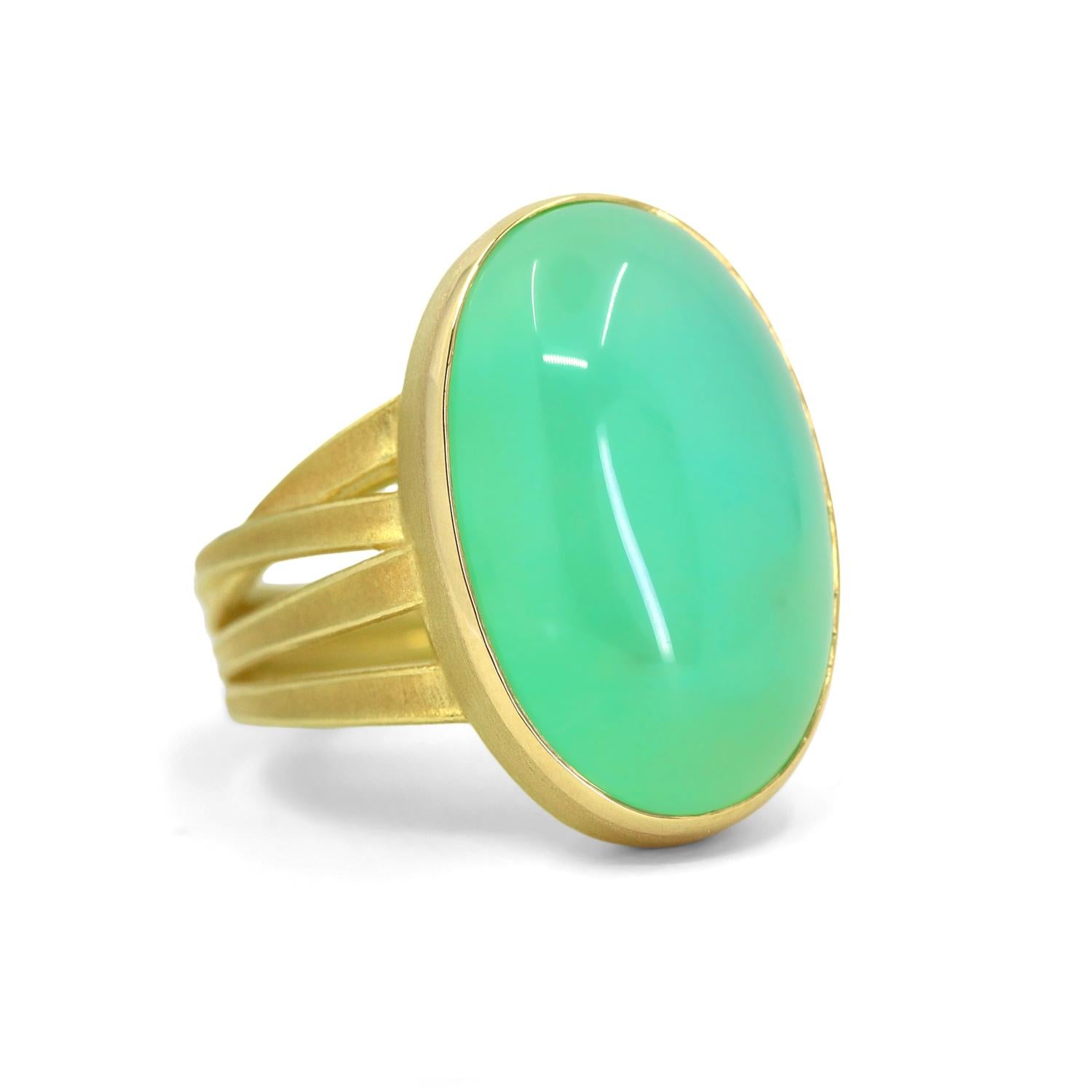One of a Kind Ribbon Wrap Ring handmade by master jewelry artist Barbara Heinrich featuring a stunning 20.19 carat natural chalcedony oval cabochon bezel-set in Barbara's signature-finished 18k yellow gold atop her signature four ribbon band. Size