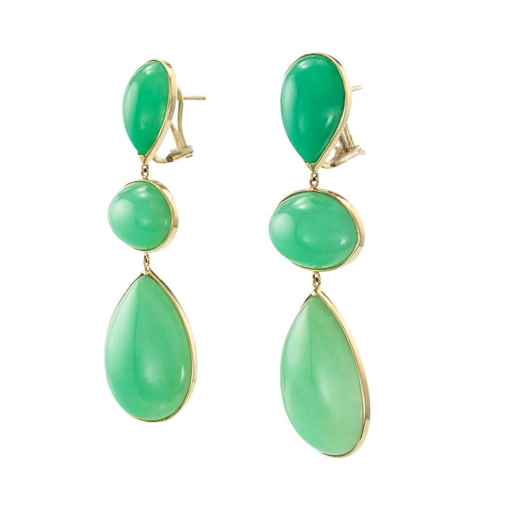 Chrysoprase and yellow gold drop earrings by Emily & Ashley. *

SPECIFICATIONS:

This is a large-scale pair of earrings.

GEMSTONES:  six oval and pear-shaped cabochon-cut chrysoprase with slight color gradation, starting with surmount featuring the