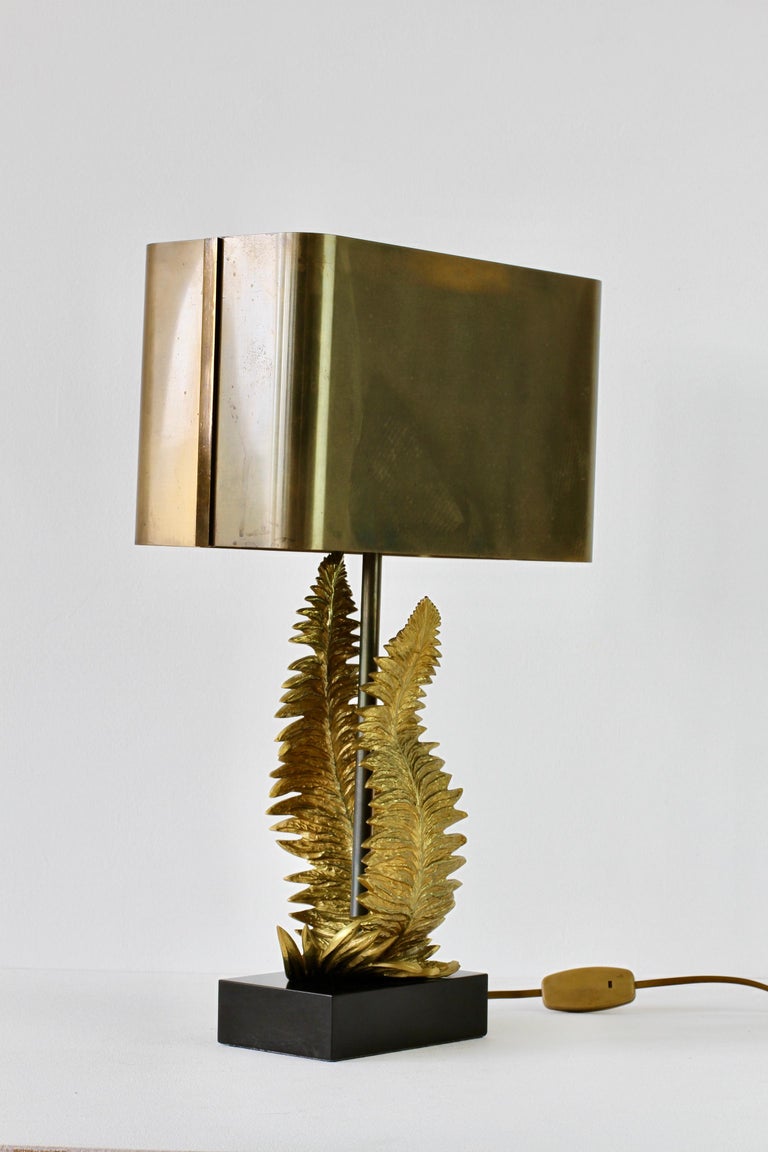 Chrystiane Charles for Maison Charles early rare signed model on a black marble base in cast brass / bronze table lamp with original brass metal shade. Opulent, ornate and decadent, everything you would expect from beautifully crafted French design.