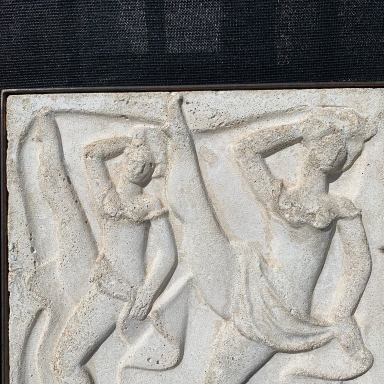 This is a wonderful depiction of two can-can dancers with Classic details. Art Deco buildings incorporated figural panels in their facades such as this exquisite bas reliefs sculpted by Chuck Dodson. This has been framed in an Industrial iron frame.