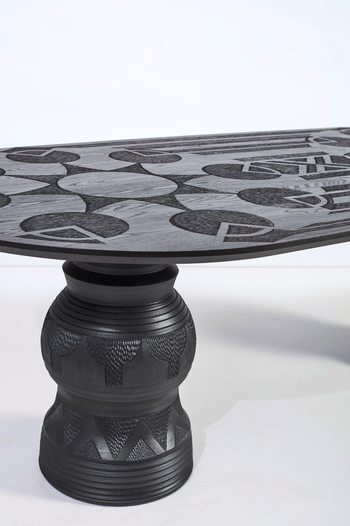 Chuma Maweni’s hand-thrown ceramic table and stools are a timeless evolution of his meditative vessels. While he has made some small side-tables before, this is his largest and most resolved piece to date. Called Imbizo (meaning “gathering” in