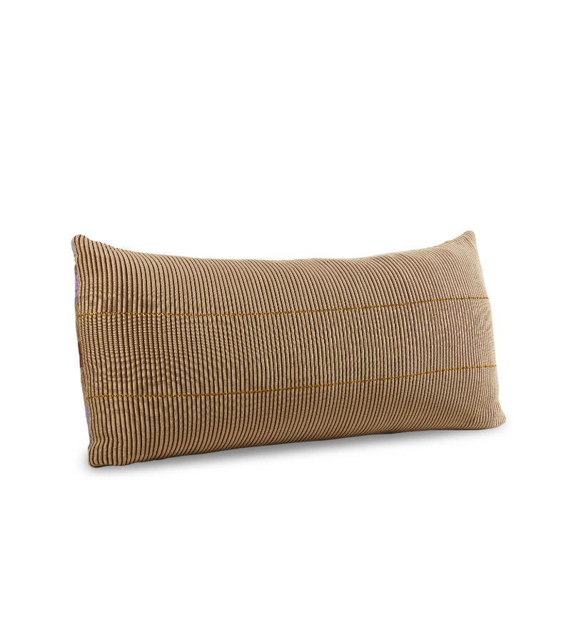 Chumbes Layer pillow by Mae Engelgeer. 
Materials: 100% Cotton. 
Technique: Hand-woven in Colombia. 
Dimensions: W 160 x H 80 cm 
Available in colors: Lila/ brick/ gold/ terra. Also available in sizes: Small, Large, and Cylinder Pillow.

The