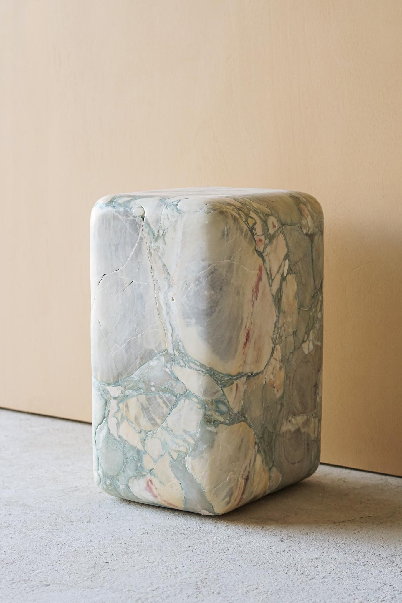 Chunk side table by Swell Studio
Dimensions: D31 x W26 x H46 cm 
Material: White alabaster, Breccia Stazzema.


Hand shaped from a solid block of stone. The unique coloration and veining in the blocks are the focal point of this simple yet
