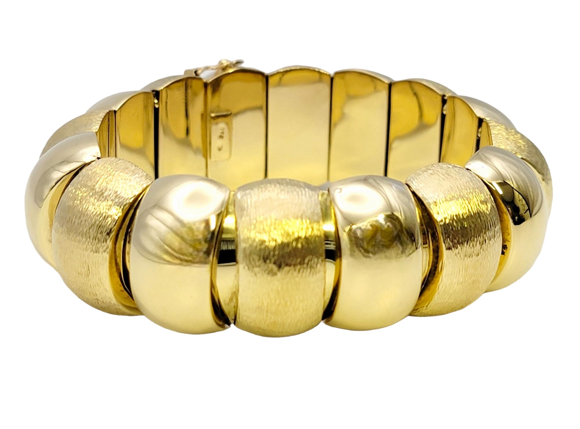 Lavish gold bracelet with gorgeous texture and design. The flexible style hugs the wrist for a comfortable and secure fit, while the simple yet luxurious design goes with just about everything. 

This striking piece features an 18 karat yellow gold