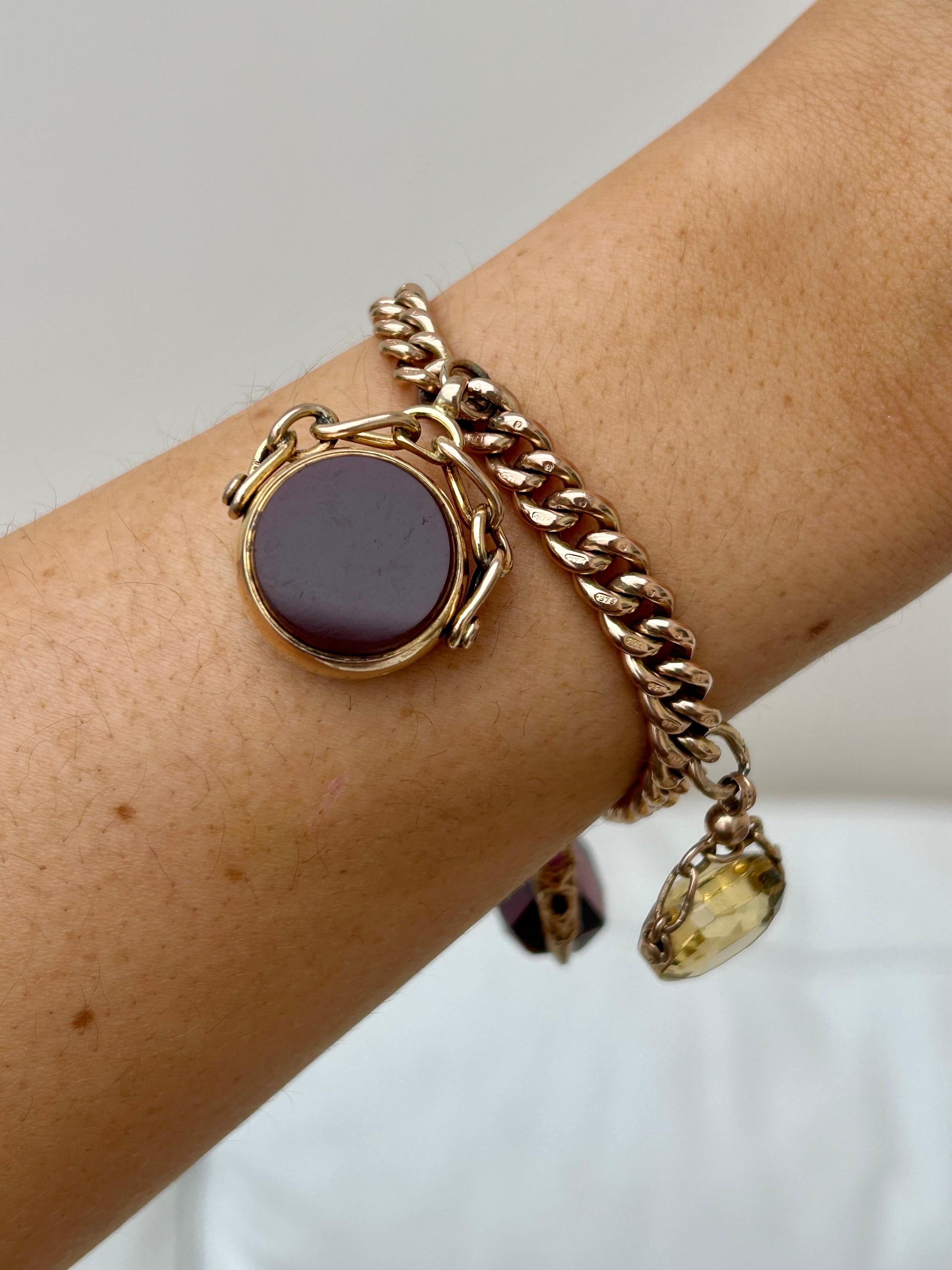 Chunky Antique 9ct Yellow Gold Curb Bracelet with 3 Fob Seal Pendant 

bloodstone, carnelian, citrine and amethyst 
incredible chunky 3 fob seal bracelet, truly excellent! 

The item comes without the box in the photos but will be presented in a