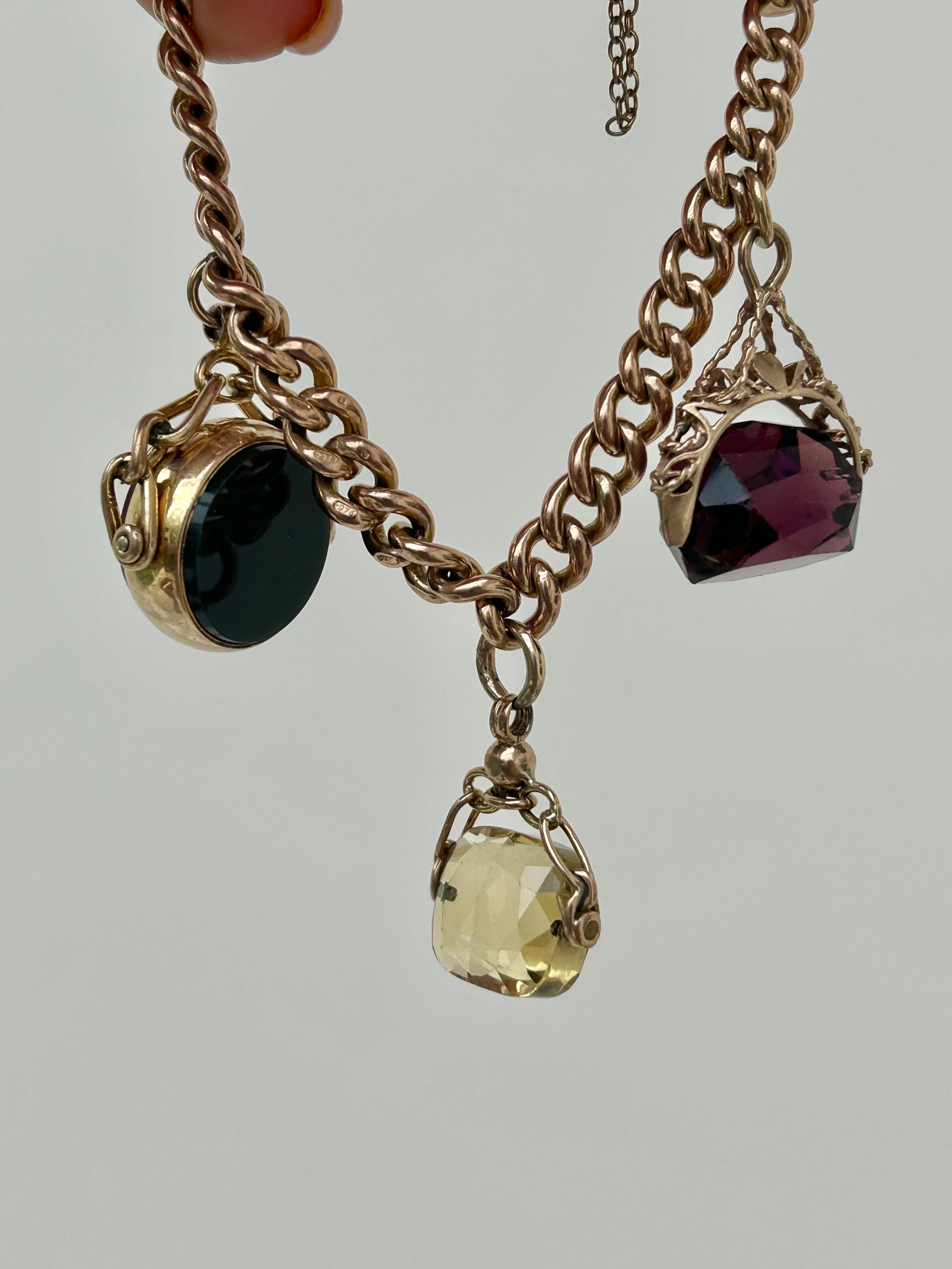 Chunky Antique 9 Carat Yellow Gold Curb Bracelet with 3 Fob Seal Pendant In Good Condition In Chipping Campden, GB