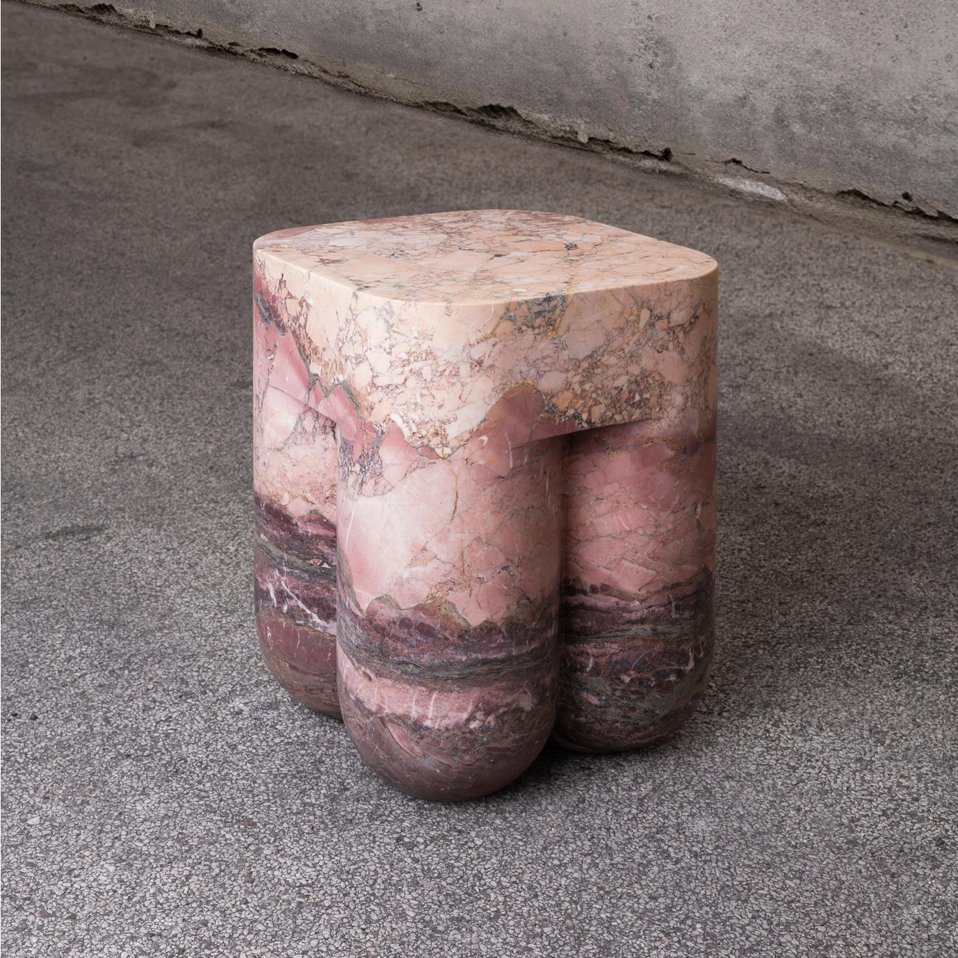 Chunky AQ stool and side table is a Limited Edition design collectible, skillfully carved from a single block of Breccia Medicea dell' Acquasanta. With its extraordinary color variations and layers, Chunky AQ tells the story of one of the rarest