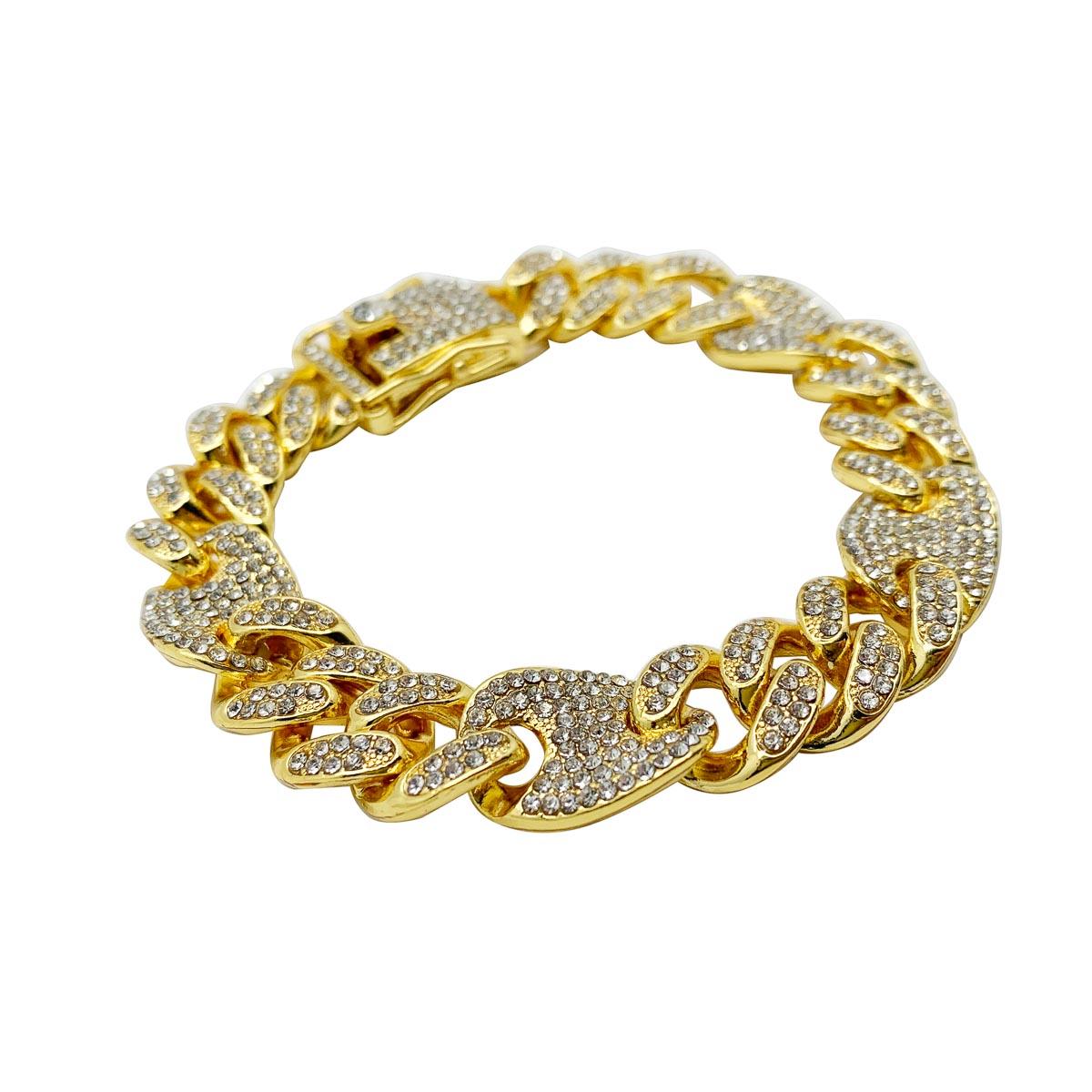 A Crystal Chain bracelet. Featuring chunky links set with crystals to dramatic effect.

Condition: Very good without damage or noteworthy wear.
Materials: Gold plated metal, glass crystal
Fastening: Push in clasp with safety clasp
Approximate
