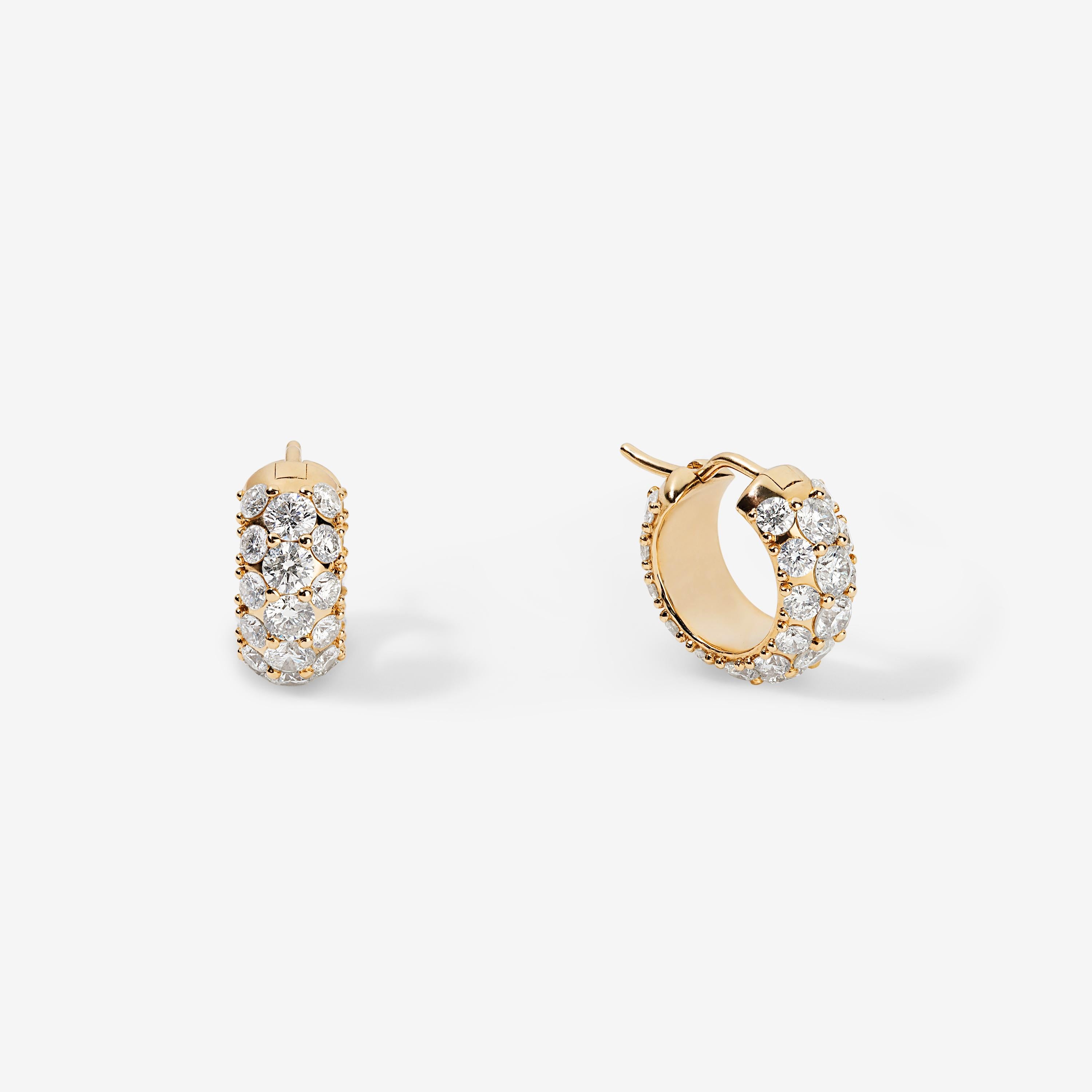 Understated, or a statement? These earrings could go either way. 3 carats of multi-sized GH VS+ natural diamonds shimmer all the way around a domed hoop that hugs the lobe. Set in solid 14k yellow gold.

Luxuriously weighted, but still