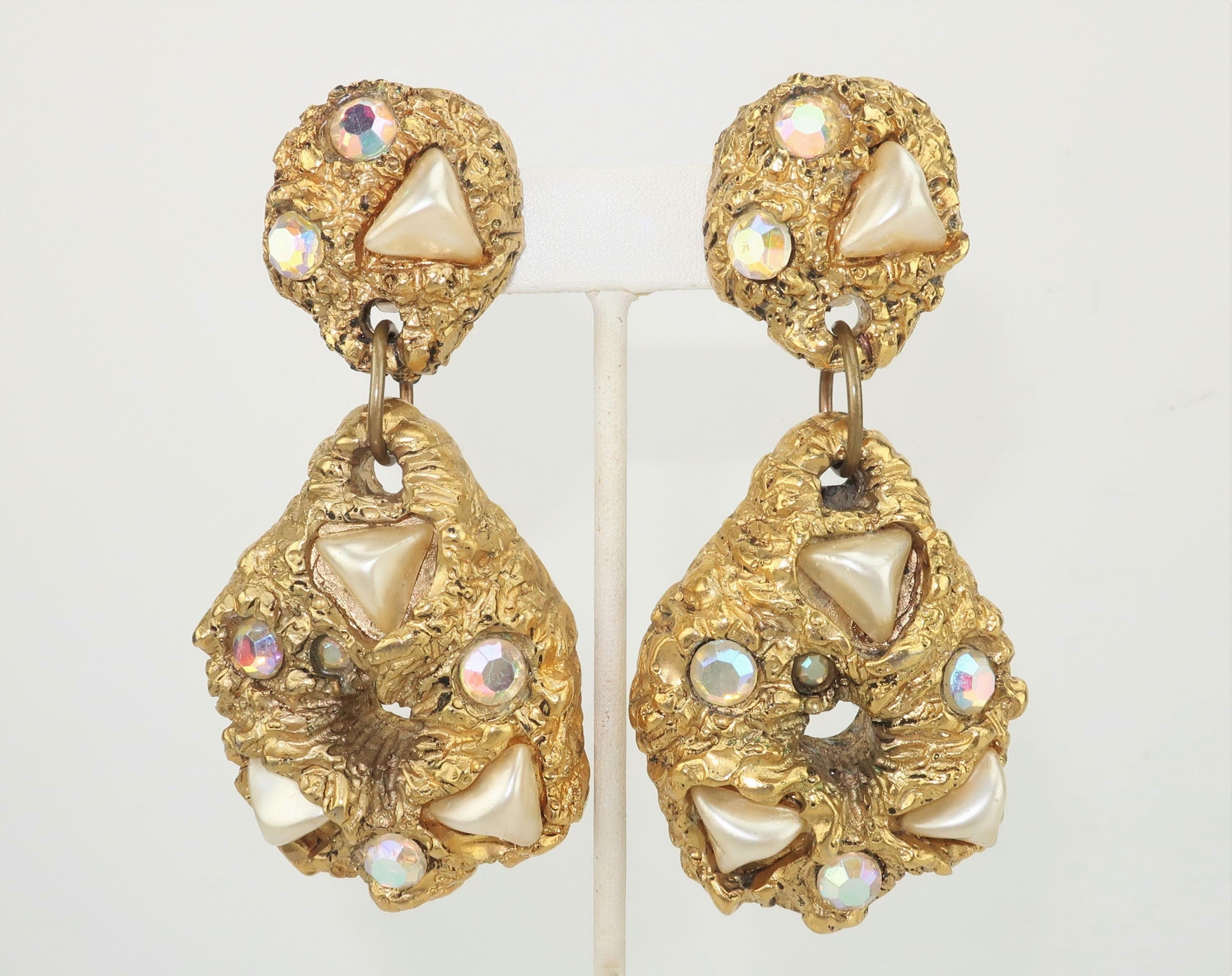 Large and in charge ... faux and fabulous!  These statement making 1980's clip on earrings appear to be chunky gold nuggets though they are actually resin decorated with a gold gilt finish and embellished with pearls and iridescent faceted