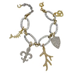 bracelet à breloques en or massif