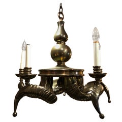 Lustre en forme de corne de bélier en laiton massif