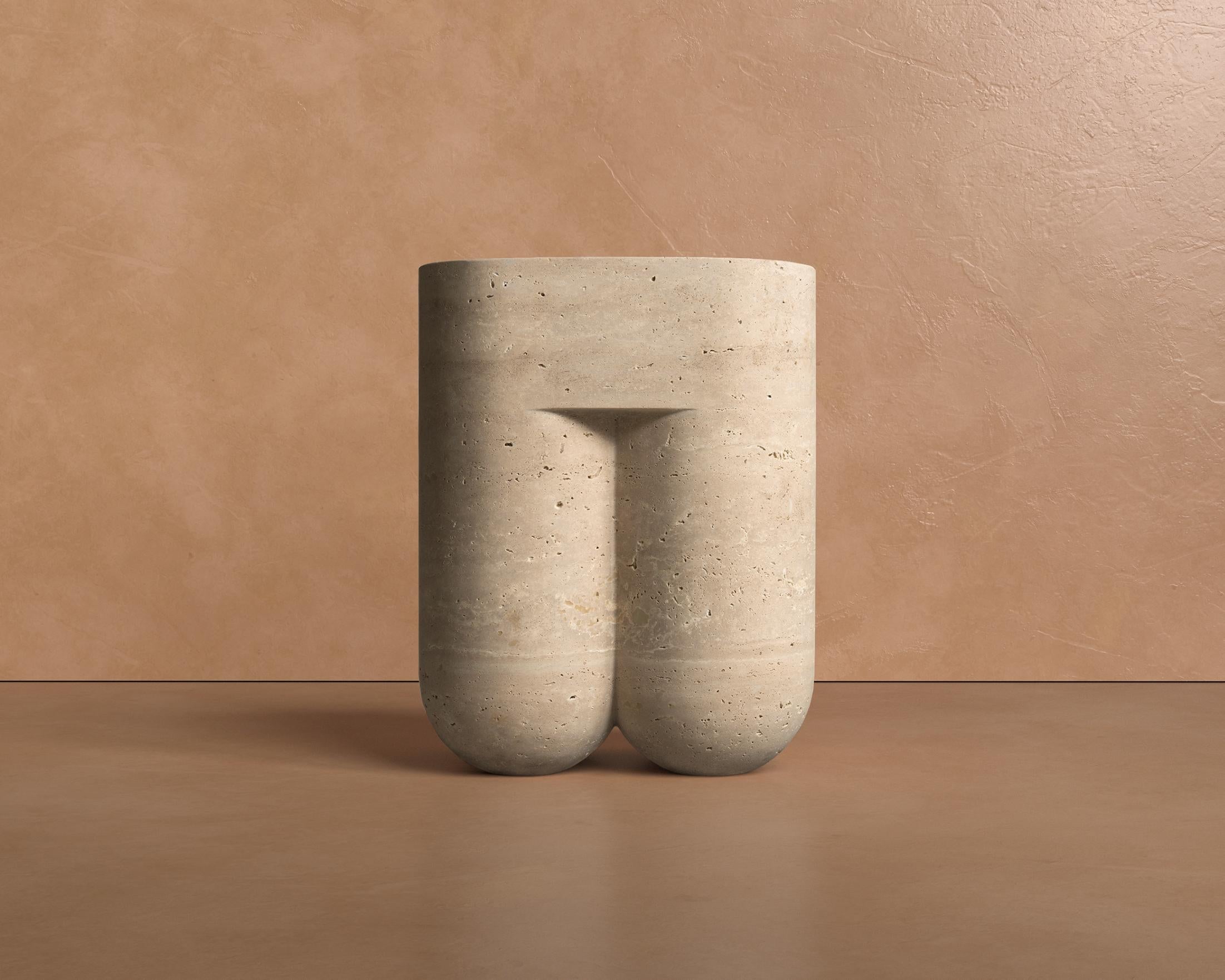 Skillfully carved from a single block of Roman travertine and finished by hand, Chunky's curves and textures combine to create a sensual and timeless collectible.

The travertine, with its naturally occurring color variations and porosity, adds an