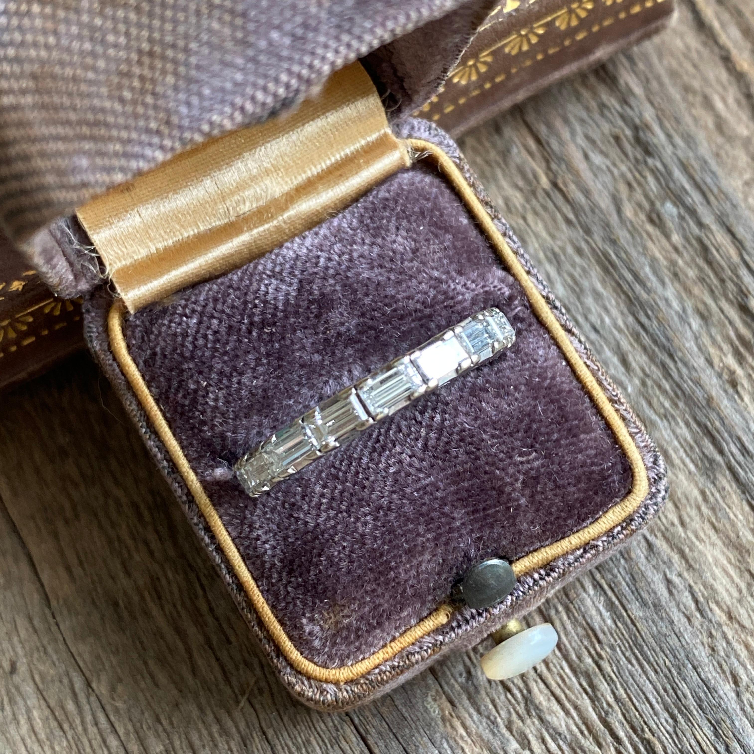 Details:
Absolutely stunning vintage 18K white gold, 2 carat baguette diamond band. Major bling in this chunky baguette ring—the diamonds are nice size, and full of sparkle and bling! This would look great in a stack, with a solitaire diamond, or
