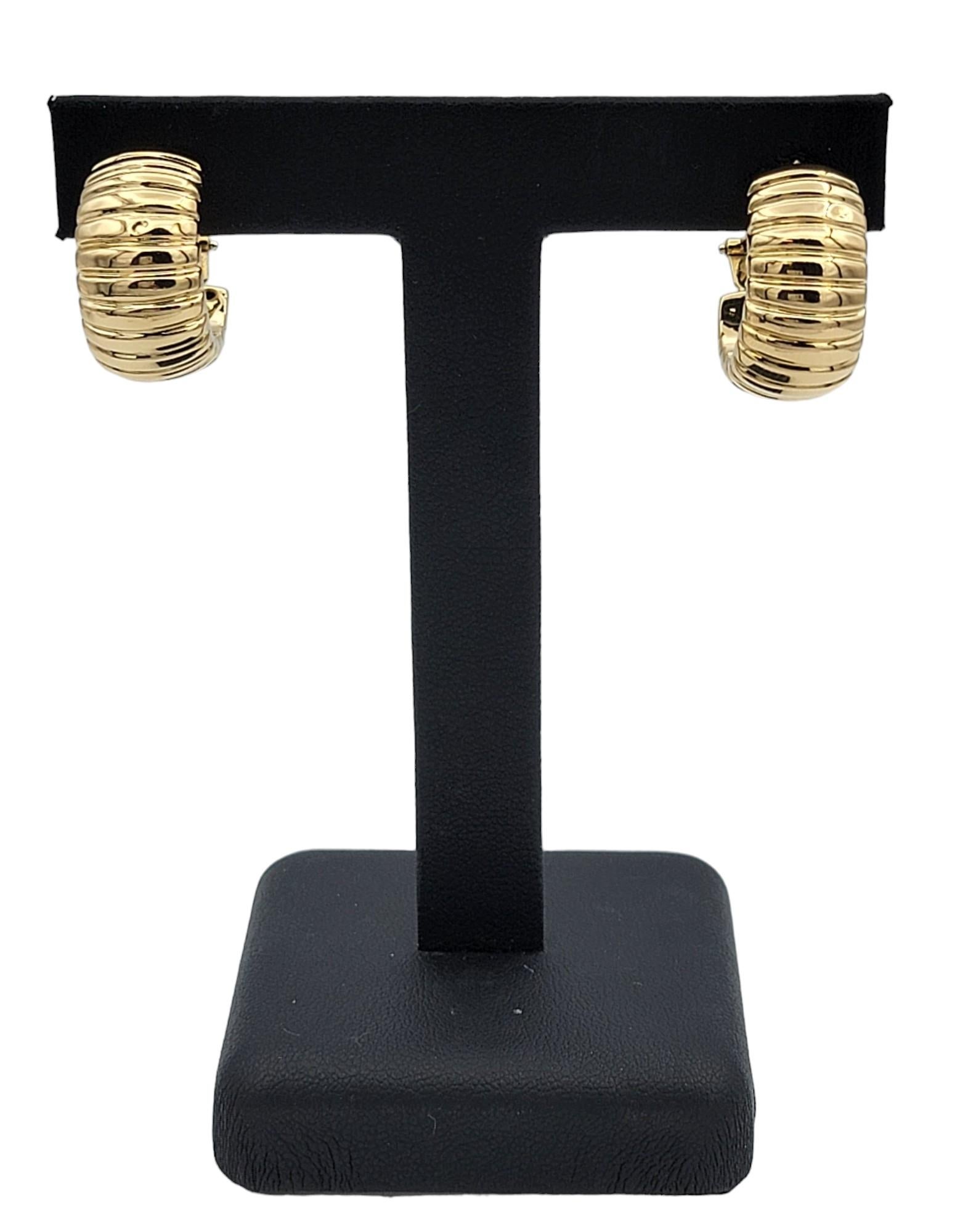 Chunky Wide Ribbed Omega Back Hoop Earrings Set in Polished 18 Karat Yellow Gold For Sale 6