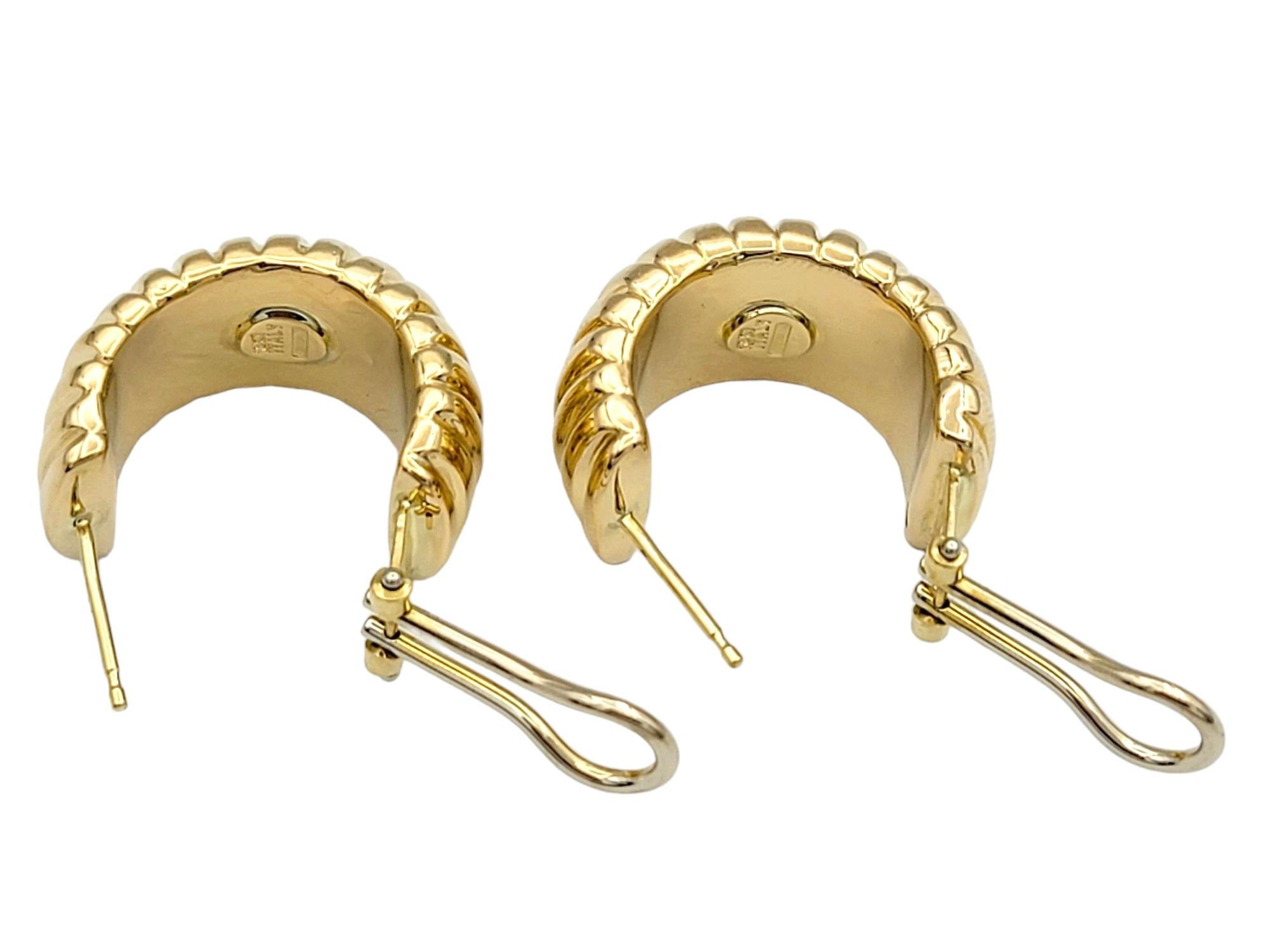 Chunky Wide Ribbed Omega Back Hoop Earrings Set in Polished 18 Karat Yellow Gold For Sale 4