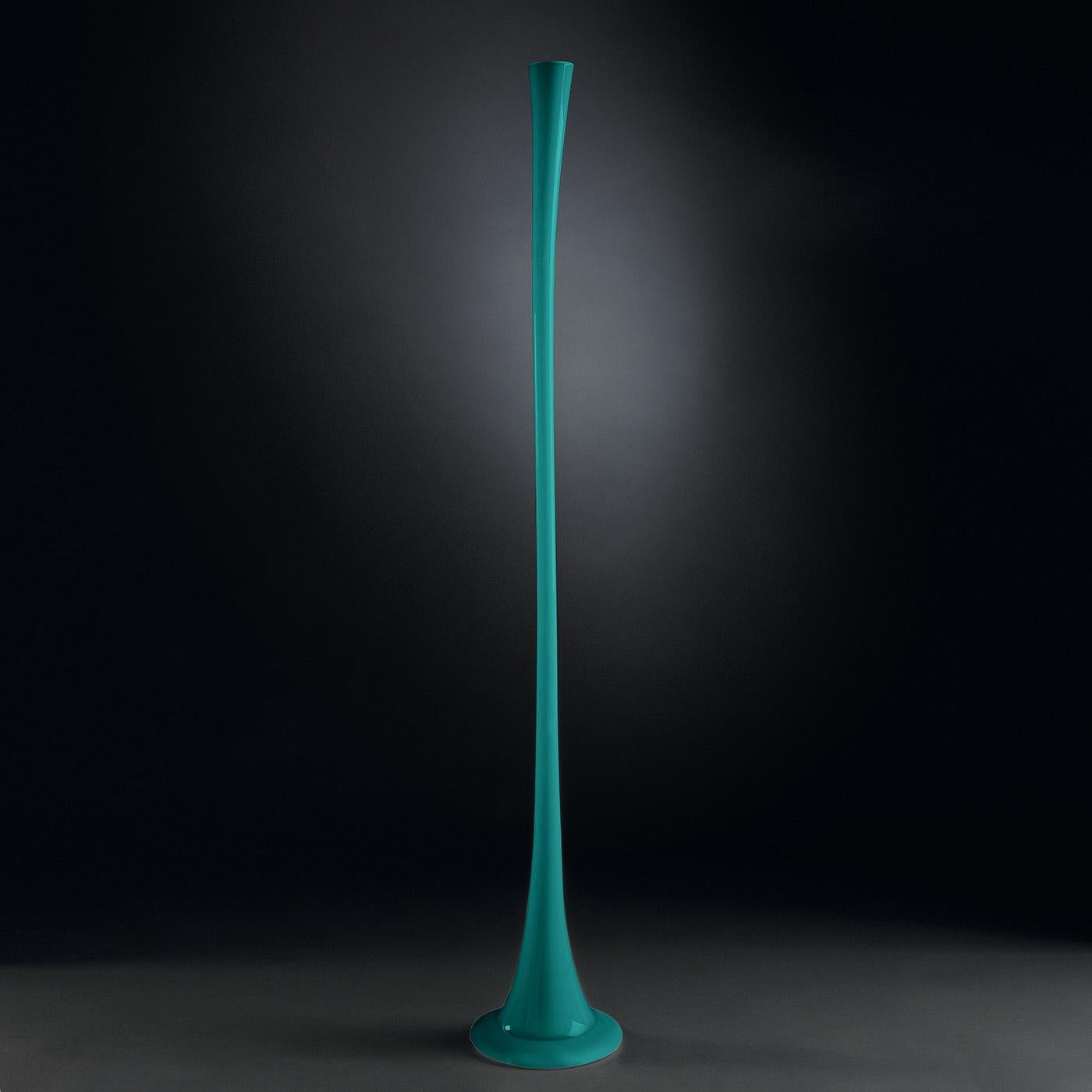 Defined by a stylish lagoon green hue of modern sophistication, this glass vase boasts a two-meter tall silhouette reminiscent of the tapered stem of a spring flower. Making a statement in a minimalist or contemporary decor, it is crafted by master