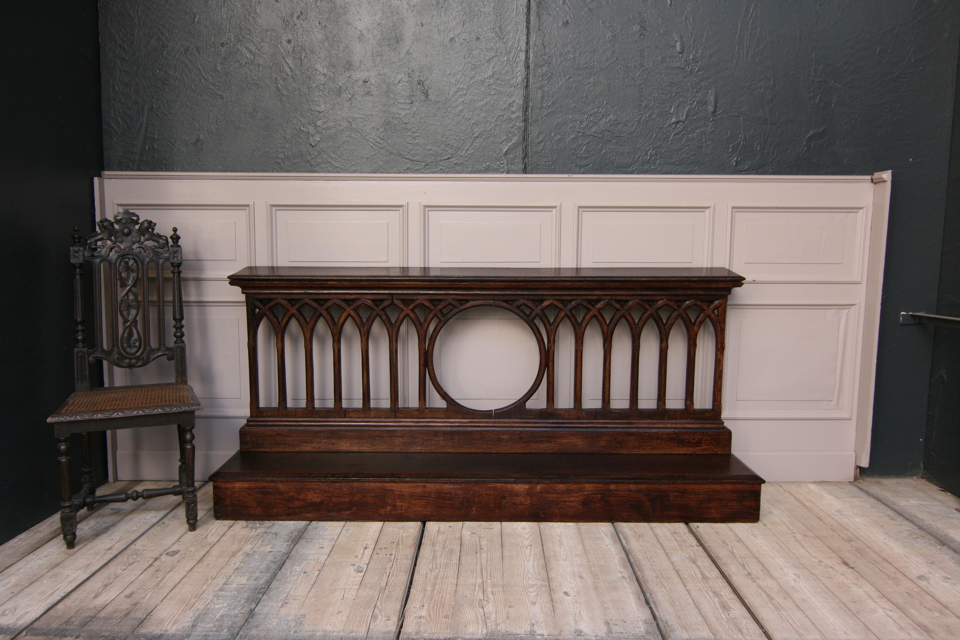 Original 19th century knee bench or prayer bench from a church in Gothic style. Made of solid oak. Restored ready for living and now ideally usable as a console. E.g. for hallways.