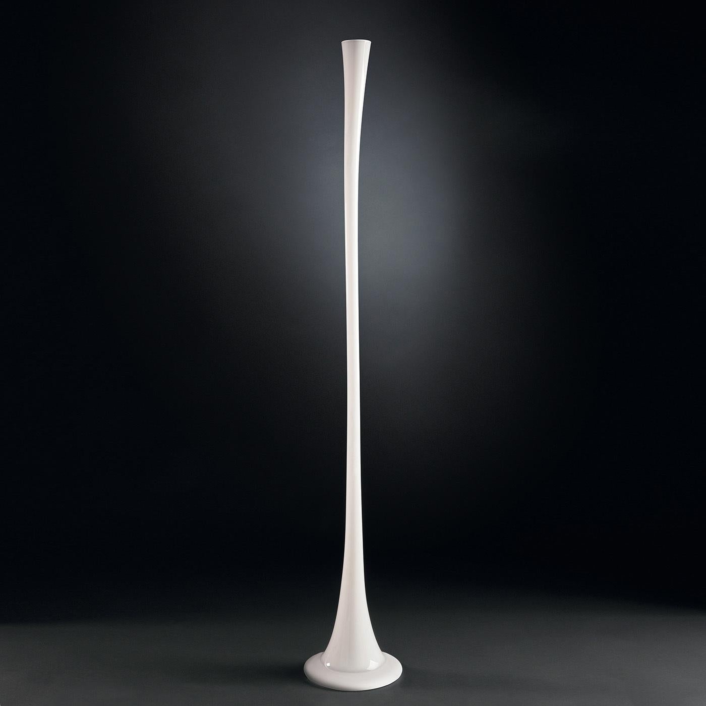 Boasting an elegant total-white look, this stunning vase is a sculptural two-meter tall objet d'art exquisitely handcrafted of glass. Its singular and tapered silhouette resembles that of a delicate spring flower stem and will make a statement in a