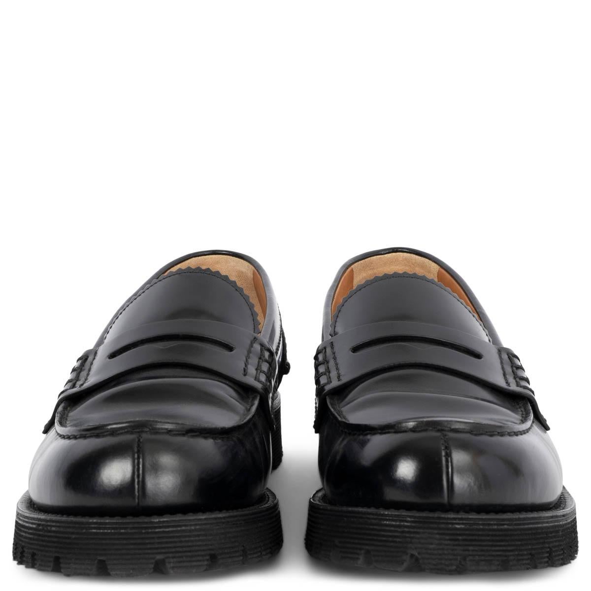 100% authentic Church's classic penny loafers in black smooth shiny calfskin with a chunky black rubber sole. Have been worn and are in excellent condition. 

Measurements
Imprinted Size	39.5
Shoe Size	39.5
Inside Sole	26.5cm (10.3in)
Width	7.5cm