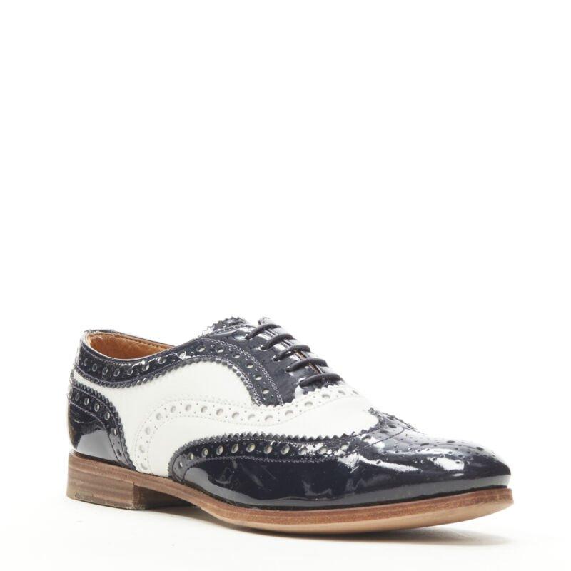 CHURCH'S Burwood black patent white perforated leather brogue EU36
Reference: ANWU/A00381
Brand: Church's
Model: Burwood
Material: Leather, Patent Leather
Color: Black, White
Pattern: Solid
Closure: Lace Up
Lining:  Leather
Extra Details: Stacked