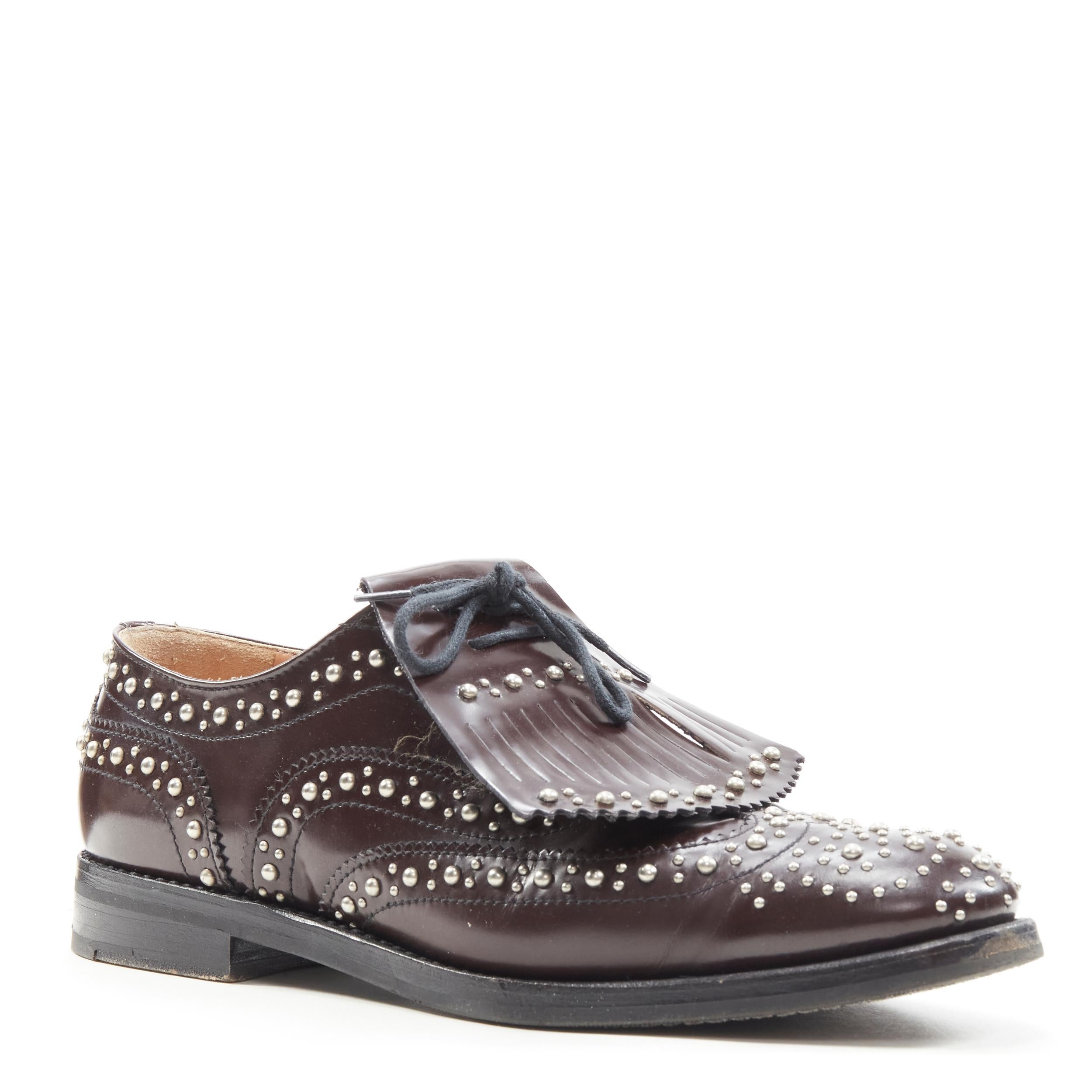 CHURCH'S Burwood Met Cordovan dark brown silver studded fringe brogue EU36 
Reference: ANWU/A00383 
Brand: Church's 
Model: Burwood 
Material: Leather 
Color: Brown 
Pattern: Solid 
Closure: Lace 
Extra Detail: Detachable fringe flap detail. 
Made