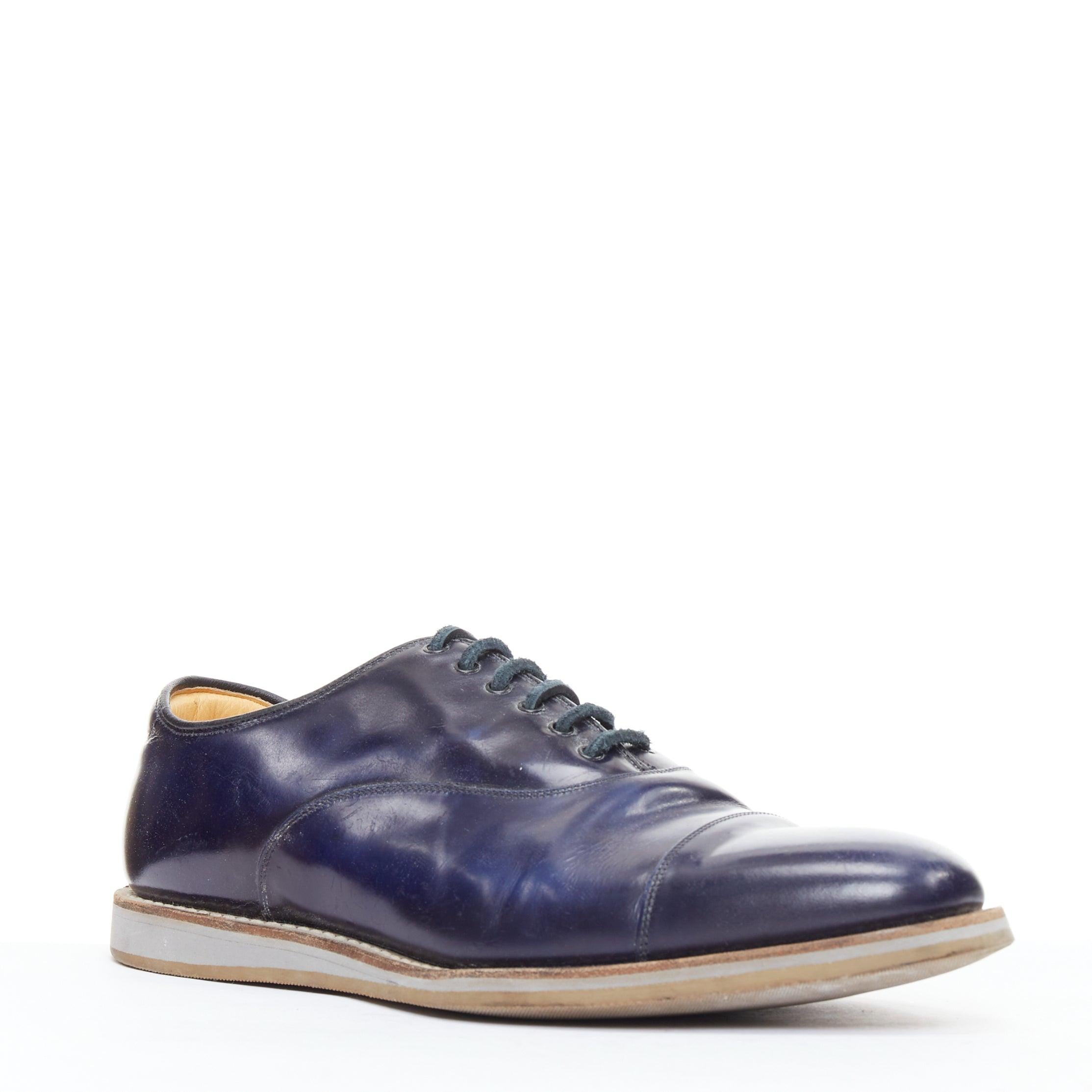 CHURCH'S Hirst navy leather lace up derby dress shoe UK8 EU42
Reference: CNLE/A00327
Brand: Church's
Model: Hirst
Material: Leather
Color: Navy, Grey
Pattern: Solid
Closure: Lace Up
Lining: Nude Leather

CONDITION:
Condition: Fair, this item was