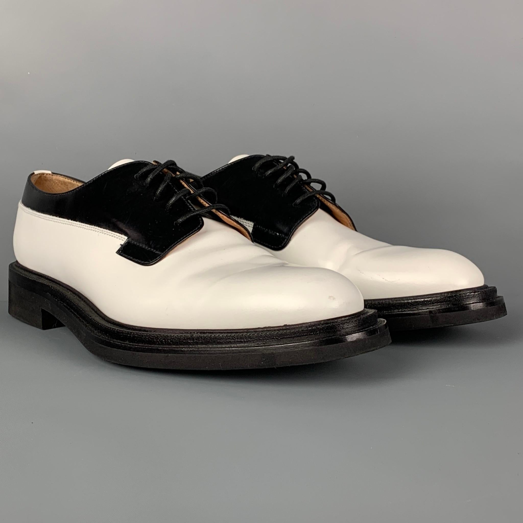 CHURCH'S 'Misty' shoes comes in a white & black two tone leather featuring a lace up closure. Includes box. Made in Italy. 

Very Good Pre-Owned Condition.
Marked: 8984103 40

Outsole: 11.75 in. x 4.5 in. 