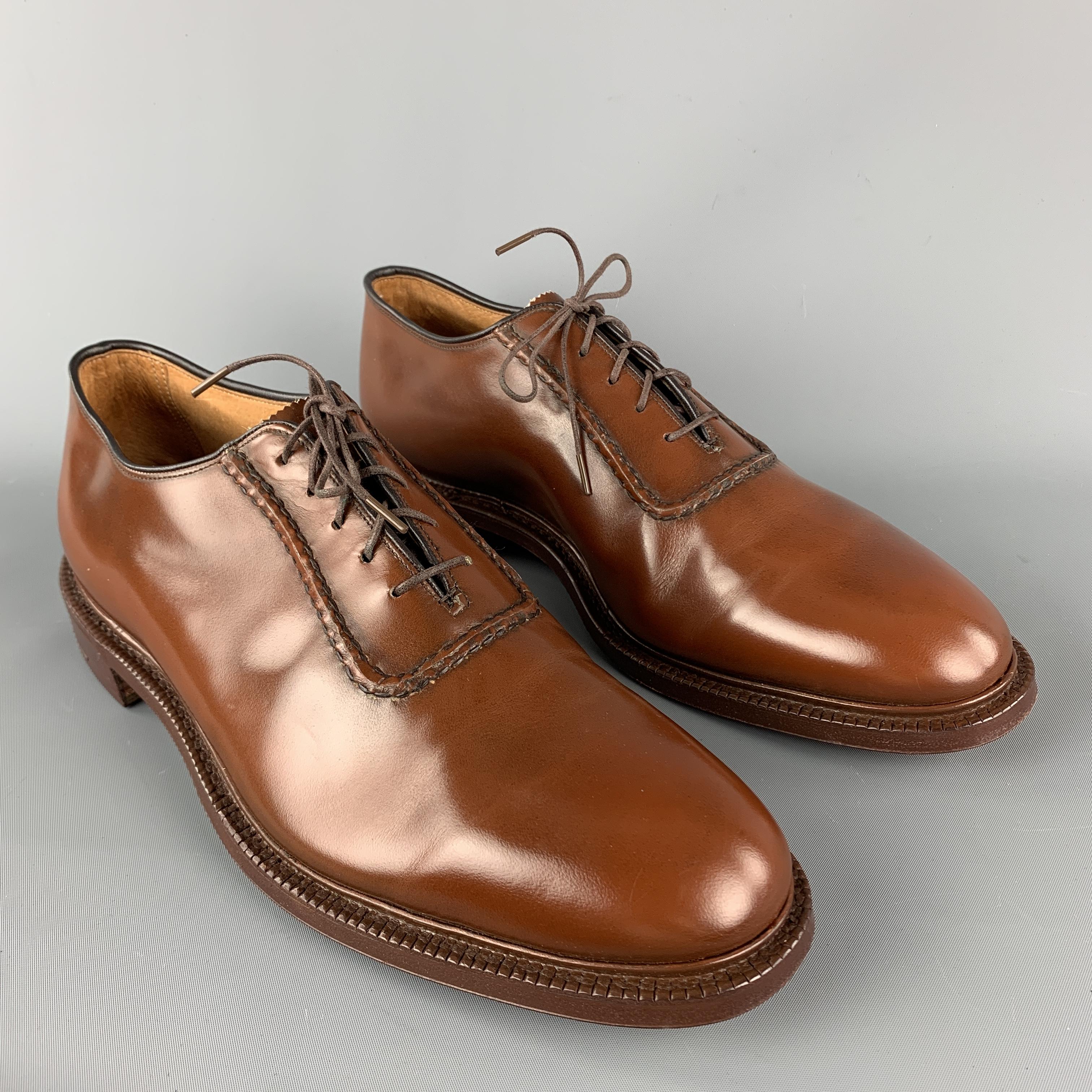 CHURCH'S Lace Up Shoes comes in a tan solid leather material, featuring a contrast stitch at top and a leather sole. Made in England. 

New with Box. 
Marked: UK 10 B  
0269TCB   Y014/617

Outsole: 12.25 x 4.5 in. 