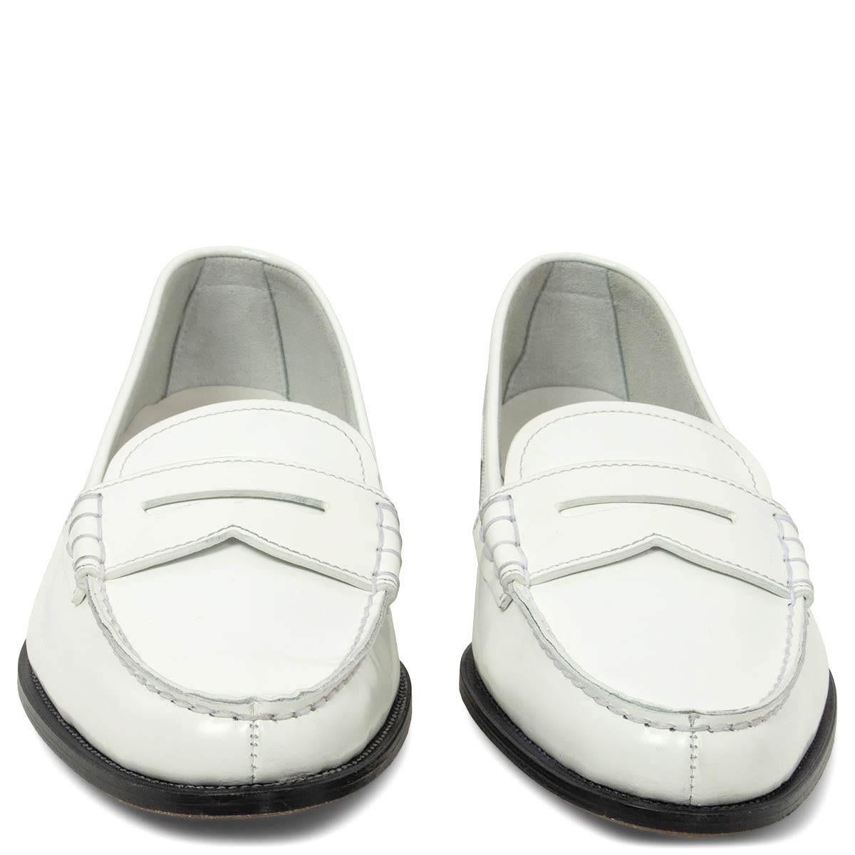100% authentic Church's Kara loafers in white glazed leather. Have been worn once inside and shows a very soft darker spot on the inside of the right heel. Overall in virtually new condition. 

Measurements
Imprinted Size	39.5
Shoe Size	39.5
Inside