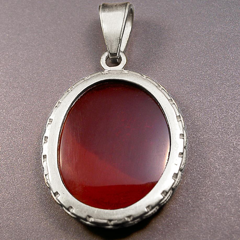 Crafted in Los Angeles with vibrant amber colored glass following an ancient Roman recipe, masterfully hand finished, and set in a sterling silver pendant.

Production time for this piece is 4-6 weeks.

Price includes a 16